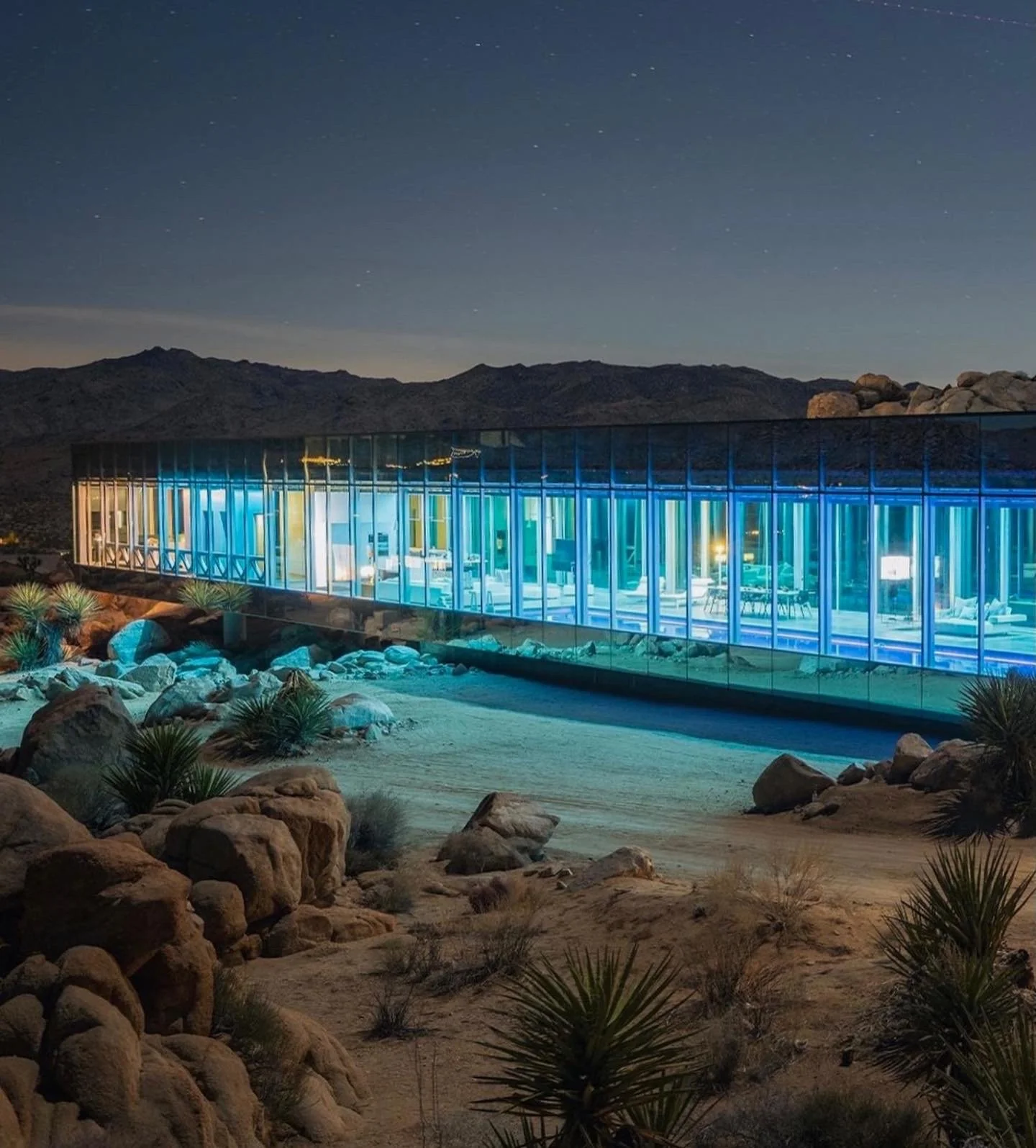 unique-joshua-tree-california-invisible-house-mirrored-horizontal-skyscraper-desert-architecture-filming-photoshoots-events-night-view.jpg