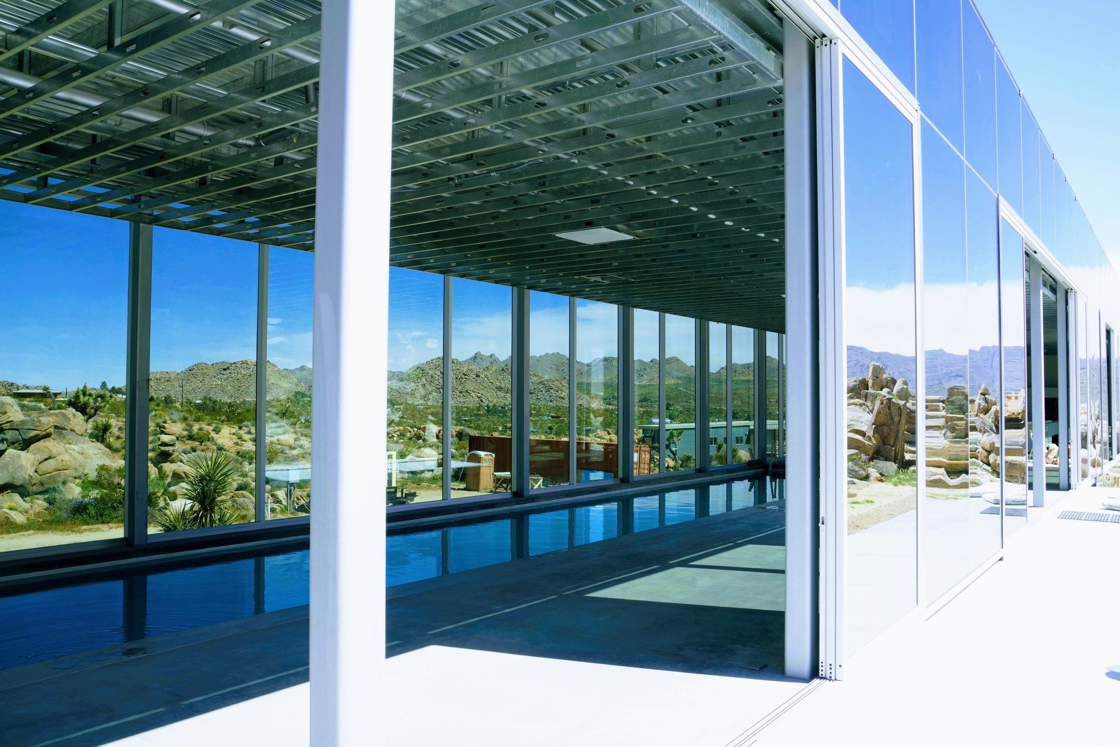 unique-joshua-tree-california-invisible-house-mirrored-horizontal-skyscraper-desert-architecture-filming-photoshoots-events-poolside (1).jpg