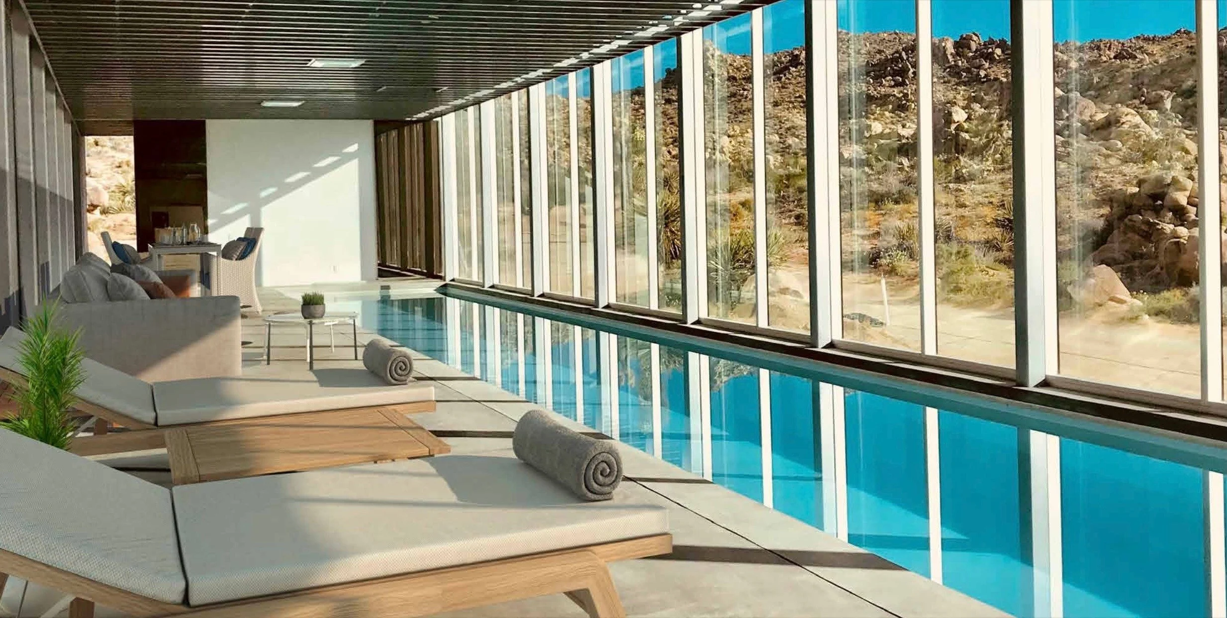 unique-joshua-tree-california-invisible-house-mirrored-horizontal-skyscraper-desert-architecture-filming-photoshoots-events-poolside-towels copy.jpg
