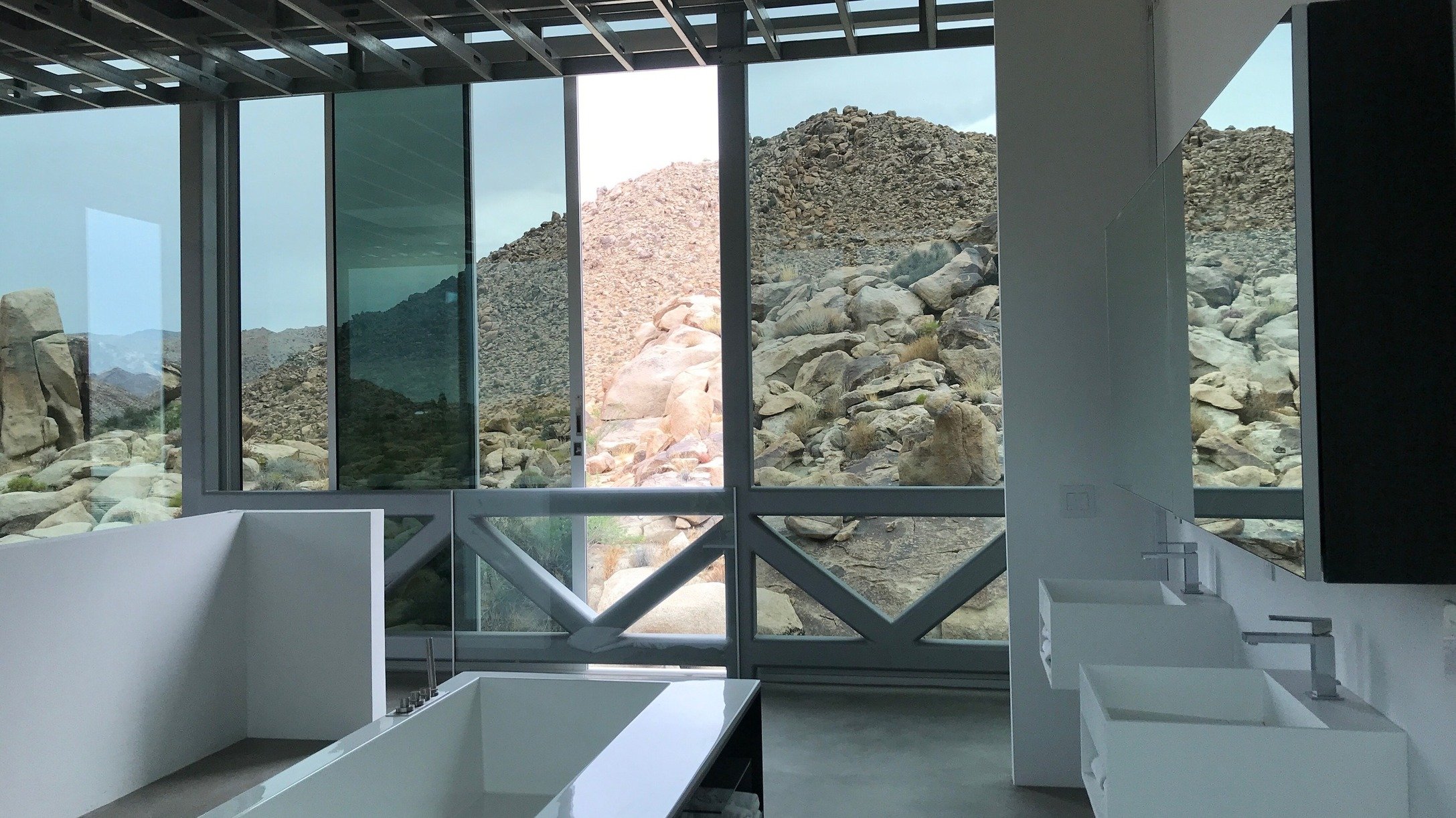 unique-joshua-tree-california-invisible-house-mirrored-horizontal-skyscraper-desert-architecture-filming-photoshoots-events-windows.jpg