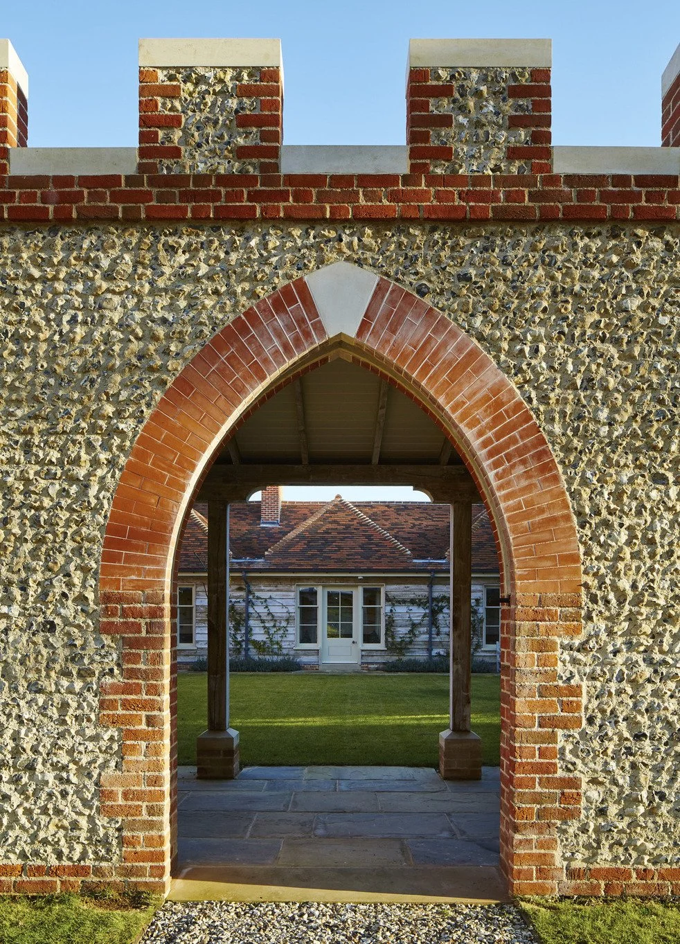 historic-period-sporting-lodge-sussex-filming-photoshoots-events-flint-brick-archway.jpg
