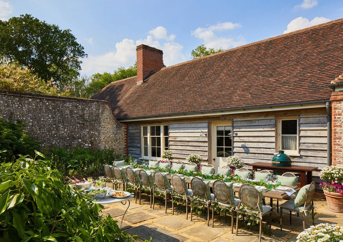 historic-period-sporting-lodge-sussex-filming-photoshoots-events-terrace-dining-table-seating.jpg