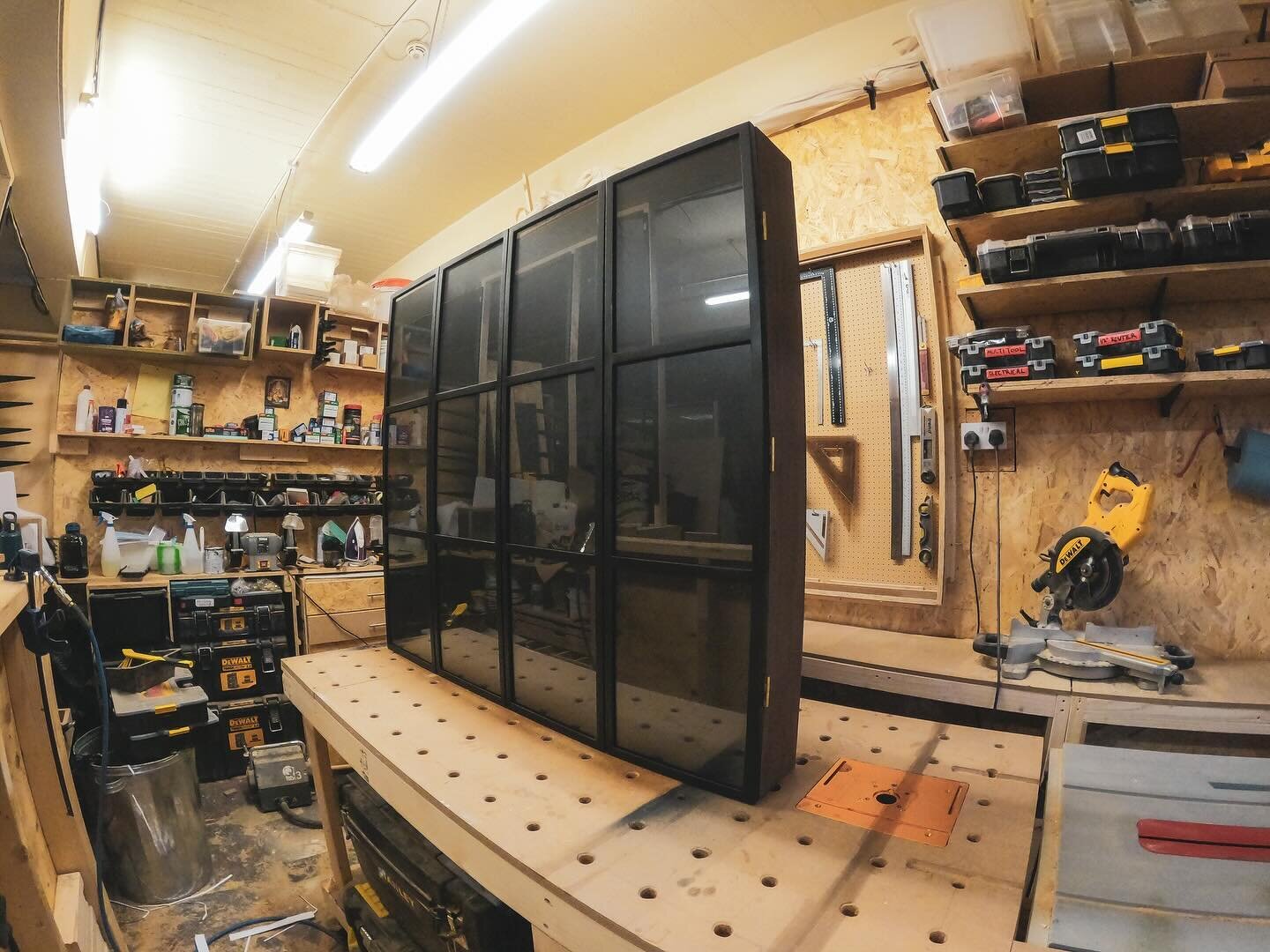 Bespoke TV cabinet with constantina doors, each made up of interchangeable picture frames for the client to place family photos in. 

-
-
-
-
#carpentry #bespoke #woodwork
