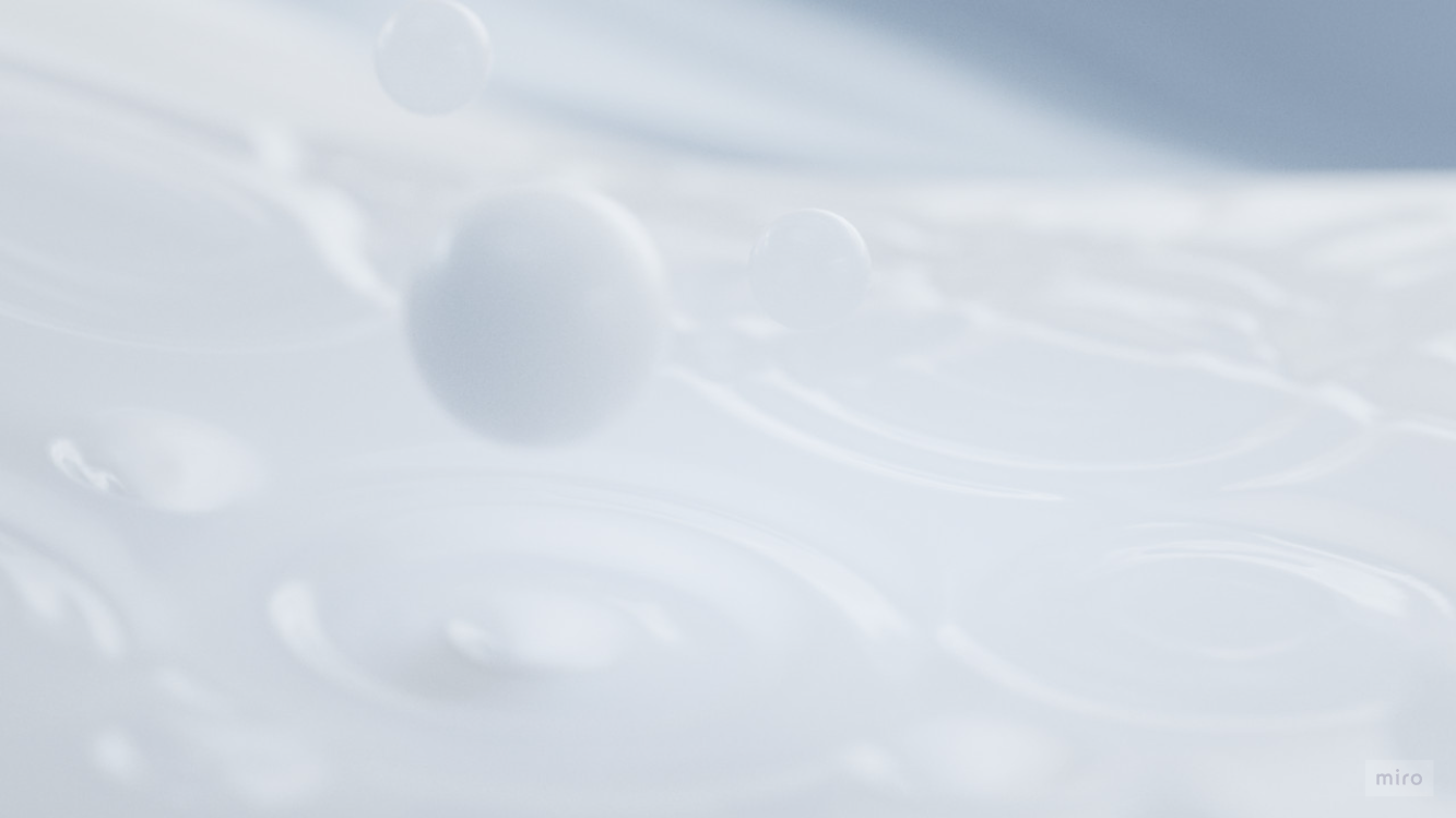 Close-up of some liquid droplets on a smooth surface.