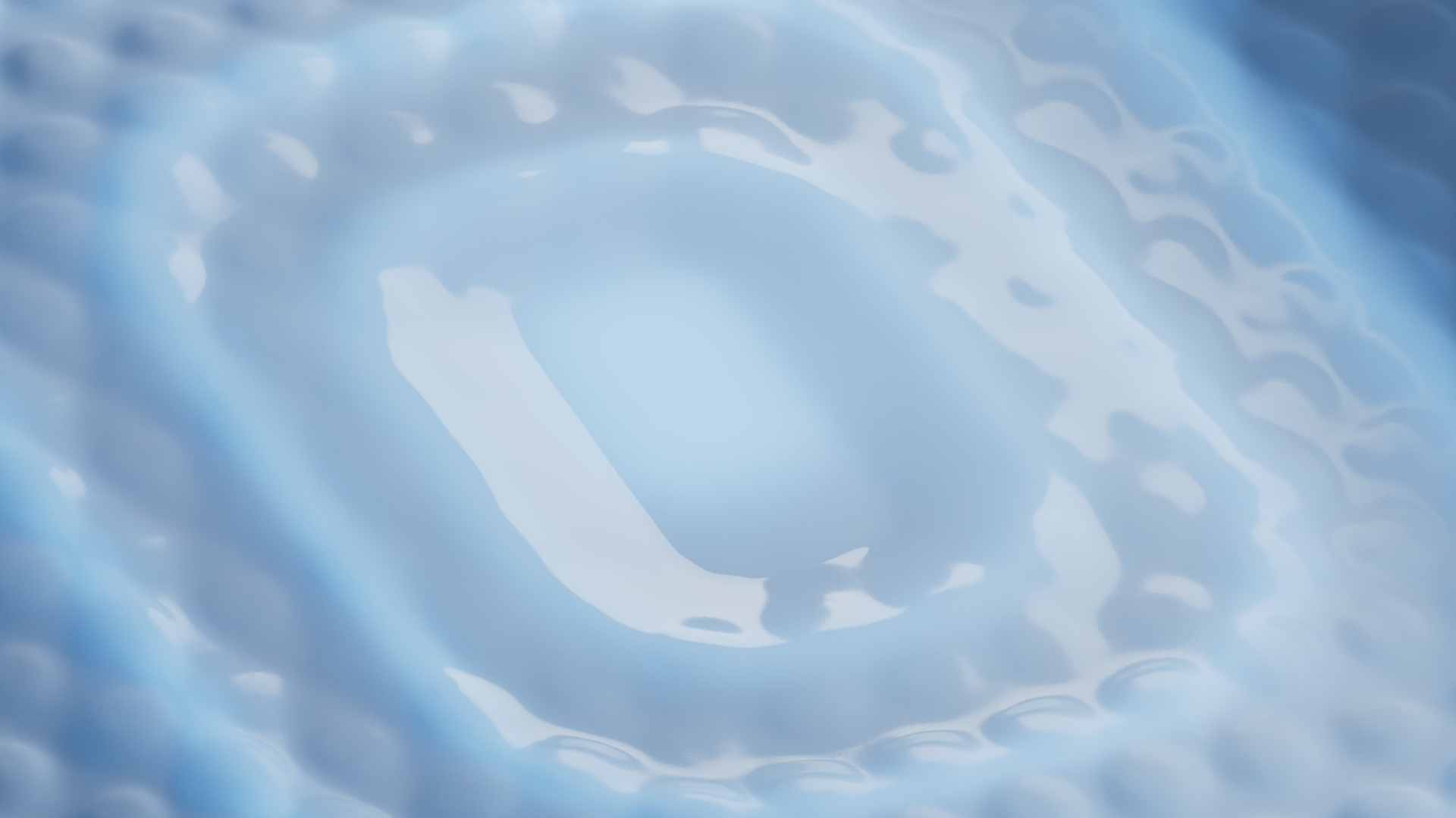 Close-up of rippling blue water surface with reflections.