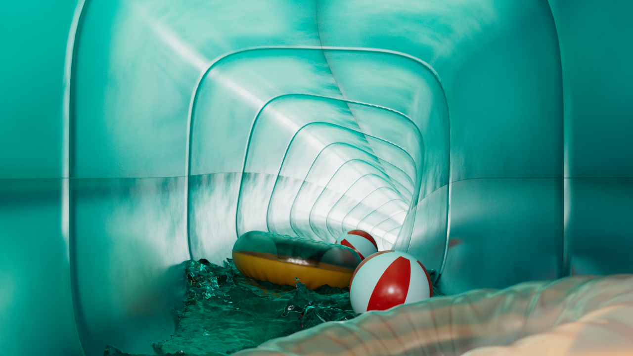 Water slide with floating beach ball and inflatable raft in a tunnel.