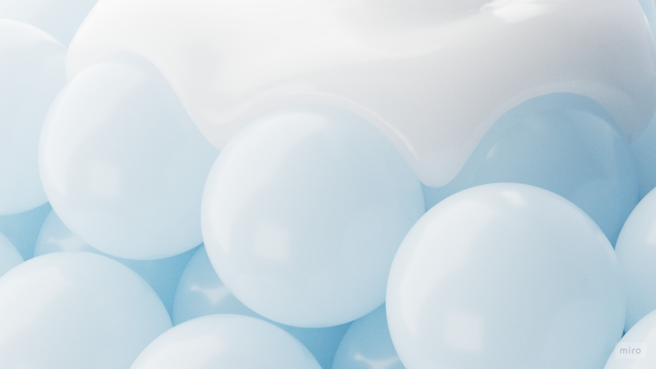 Close-up of numerous light blue balloons clustered together.