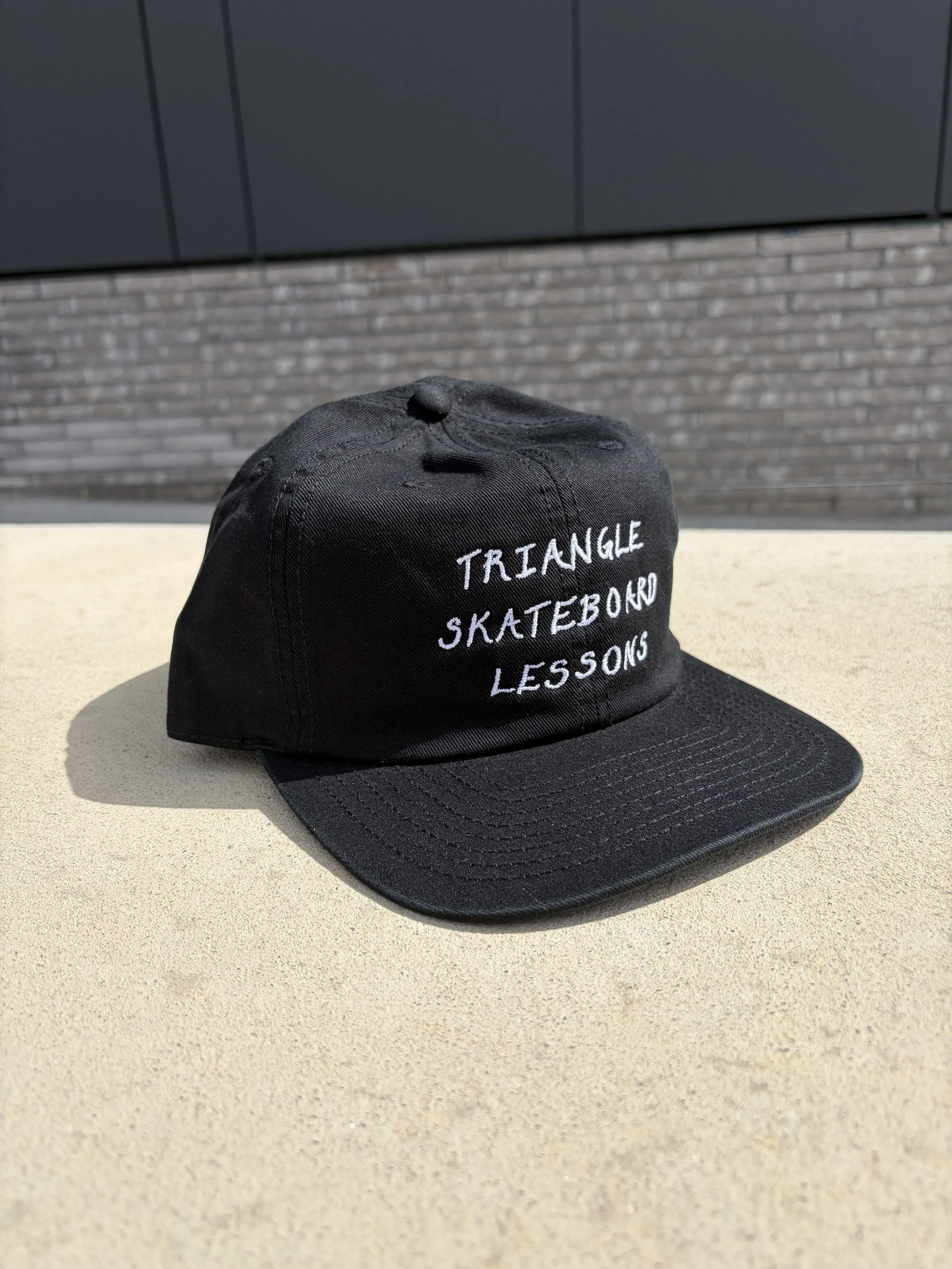 Triangle Skateboard Lessons Hat