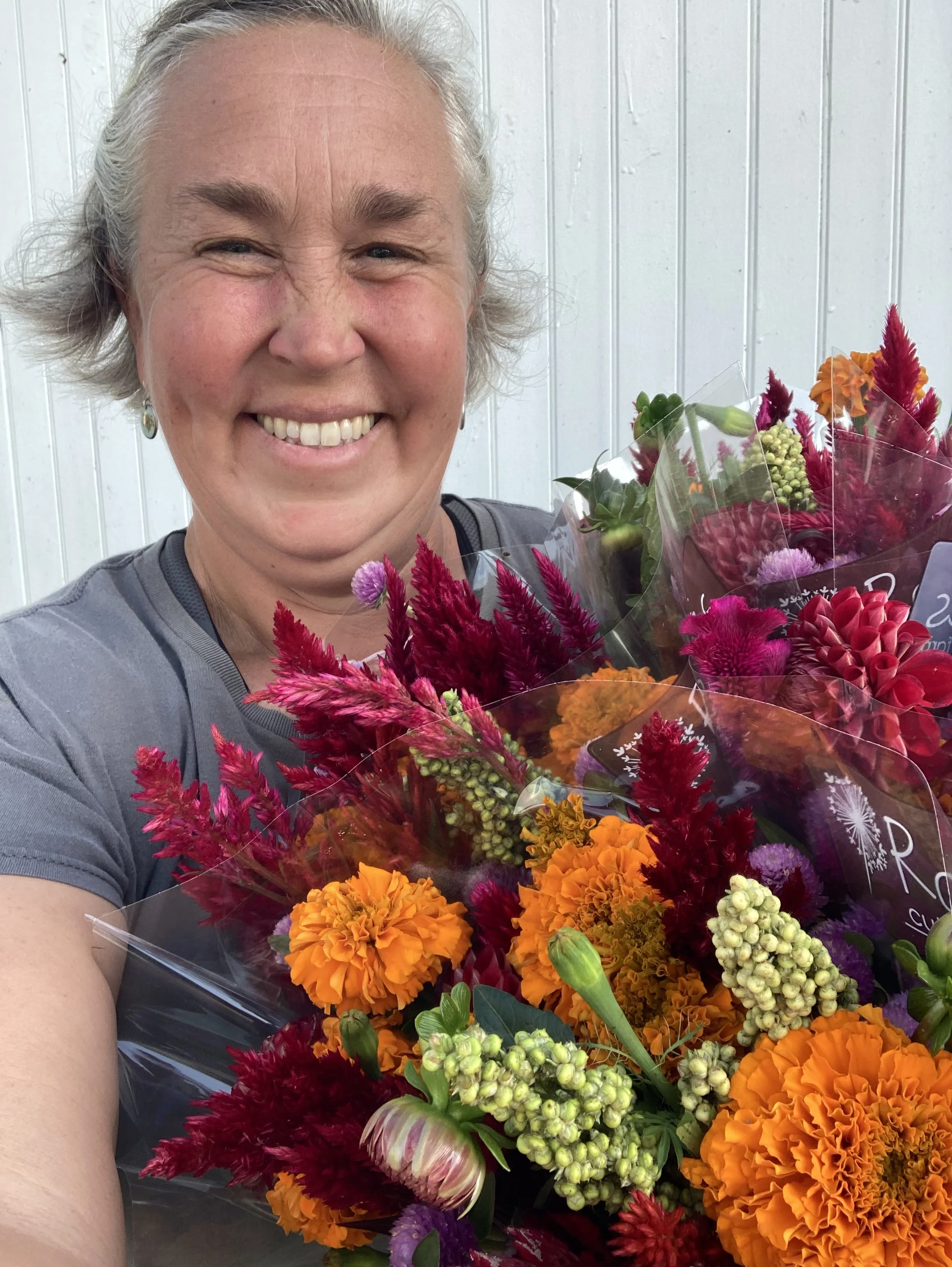 Michelle Elston of Roots Cut Flower Farm joins Jenny Marks on the Six Figure Flower Farming Podcast to discuss how to build an efficient flower farm.