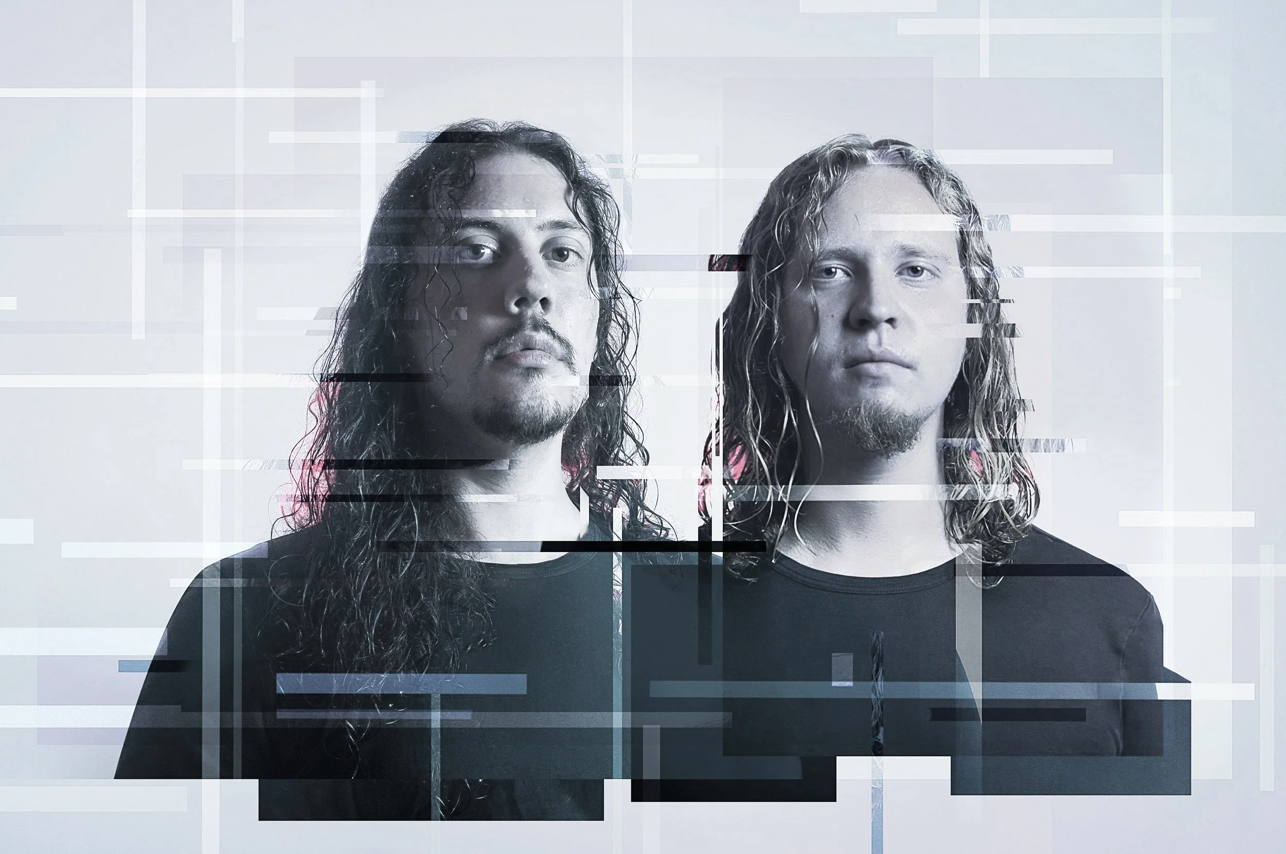 Two men with long hair and beards, featuring digital glitch effects over the image, standing against a light background.