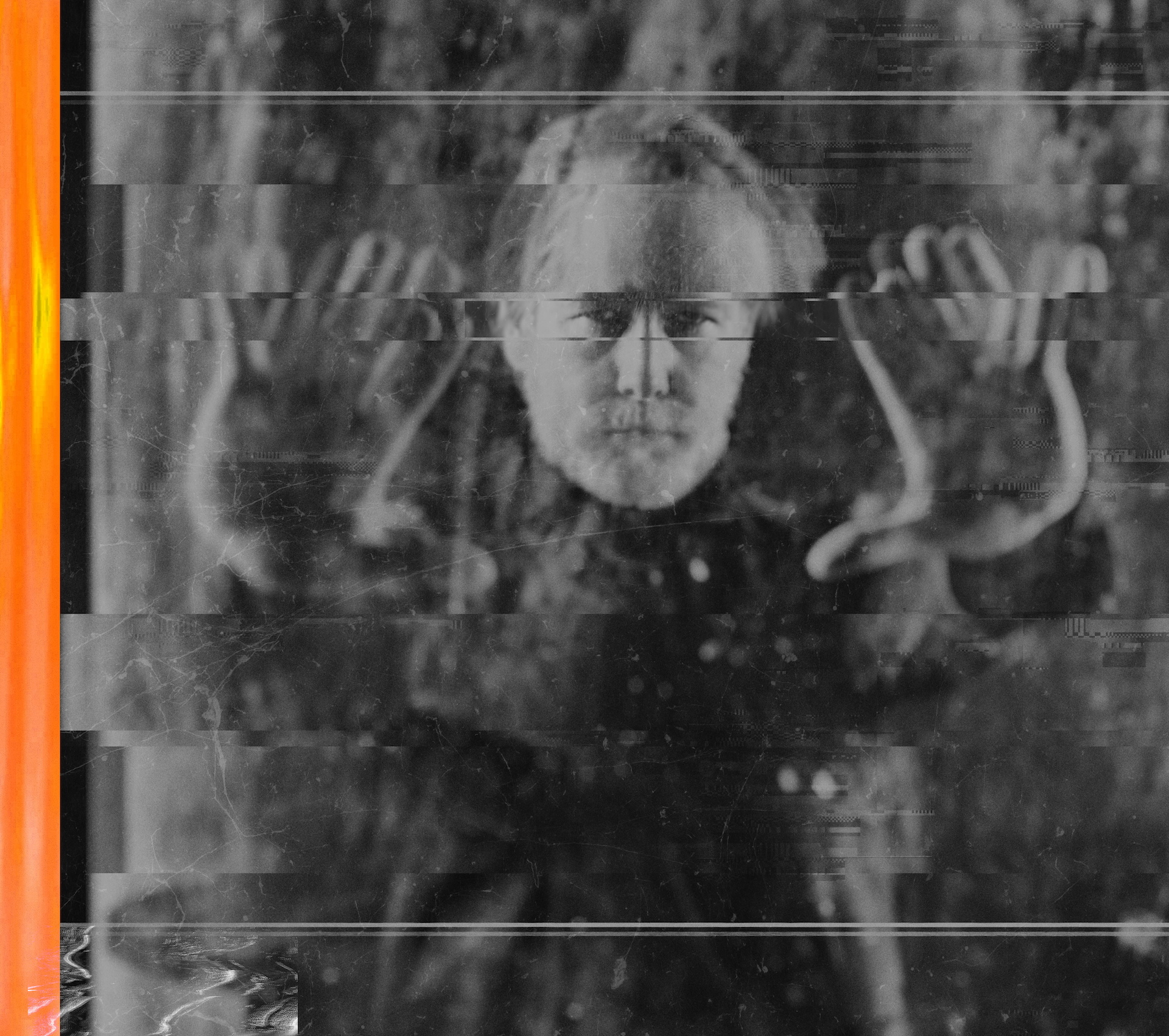 Black and white distorted portrait of a person with hands raised against a glass.