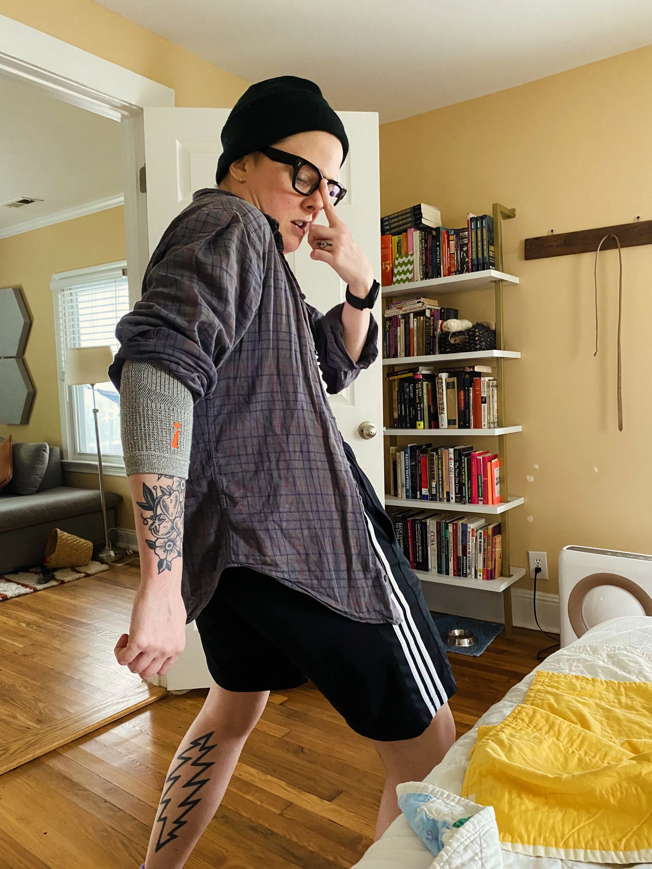 Lil bit of long weekend dance moves for ya tl 🤓

Image description: white person in adidas shorts and grey button down wearing a beanie and solid black glasses, turns towards the camera giving a funny push the glasses up pose. They have tattoos on t