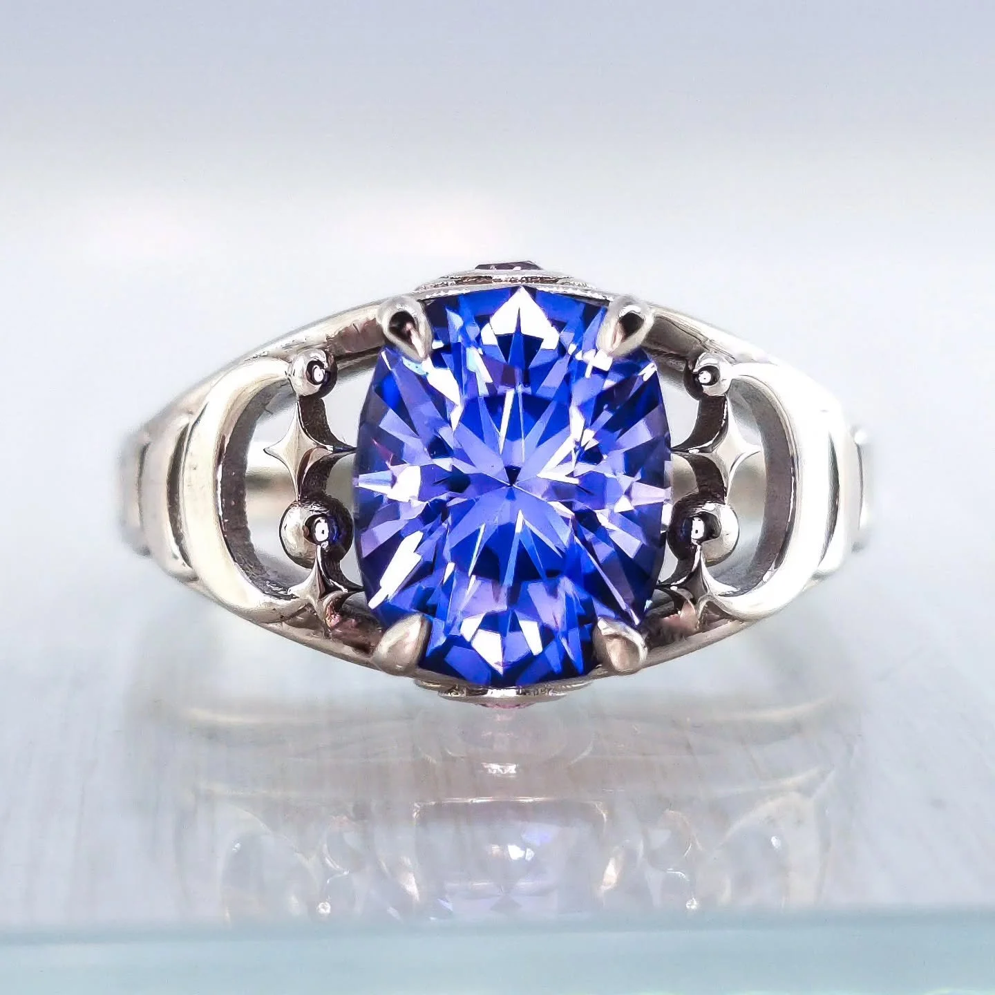 🌒✨Proud to share a recent custom piece&mdash;a 10kt white gold ring featuring a blue lab sapphire I cut, set in a gem design by Arya Akhavan. The natural pink sapphires on the sides add a lovely surprise. This ring is part of my Celestial Line, and 
