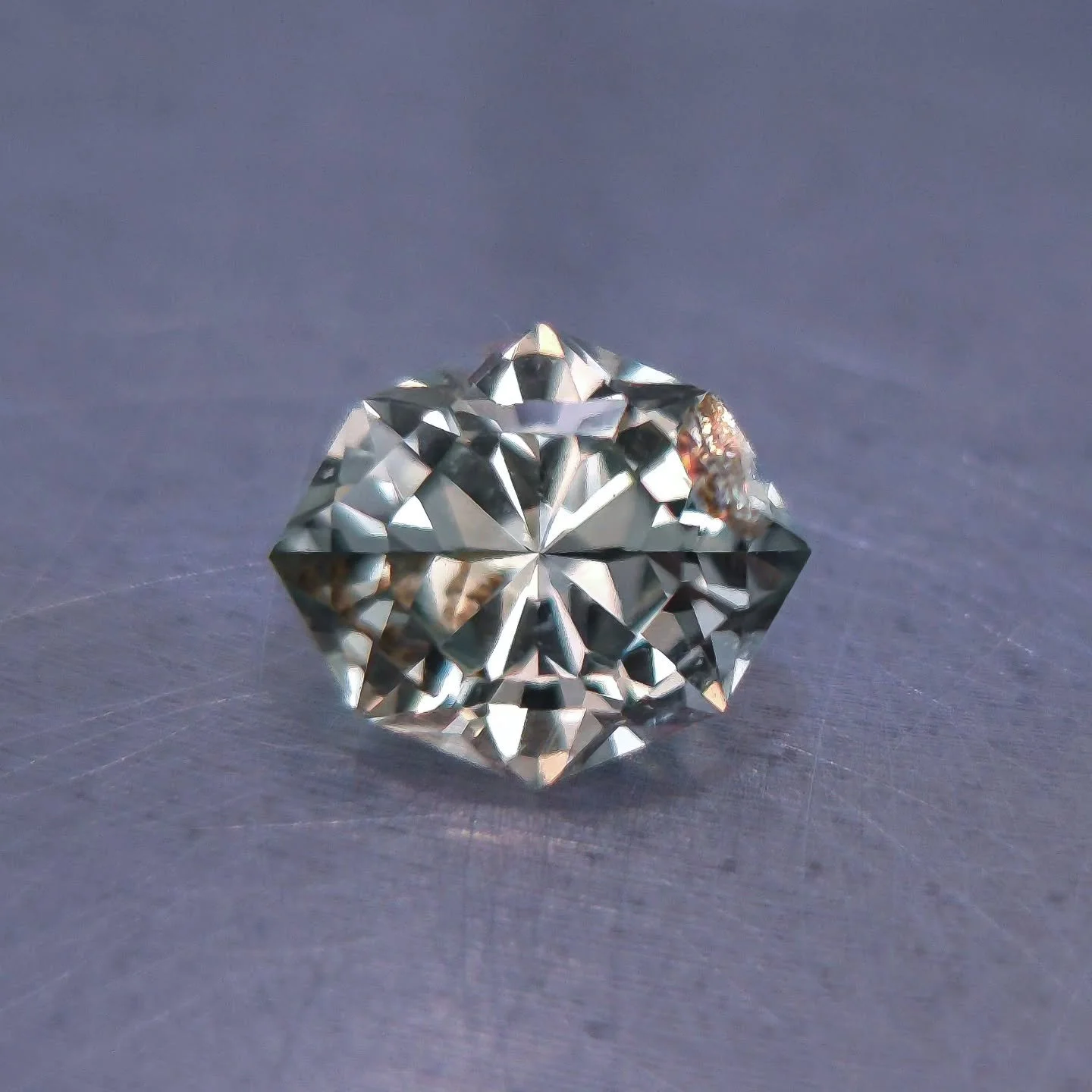 Available just today - 1.33 ct Natural Montana sapphire - unheated - 7.3 x 6.3mm Lovely green color with one small inclusion on corner, otherwise extremely eye clean and sparkly! This was cut in a marquis version of the &quot;Hope Diamond&quot; desig