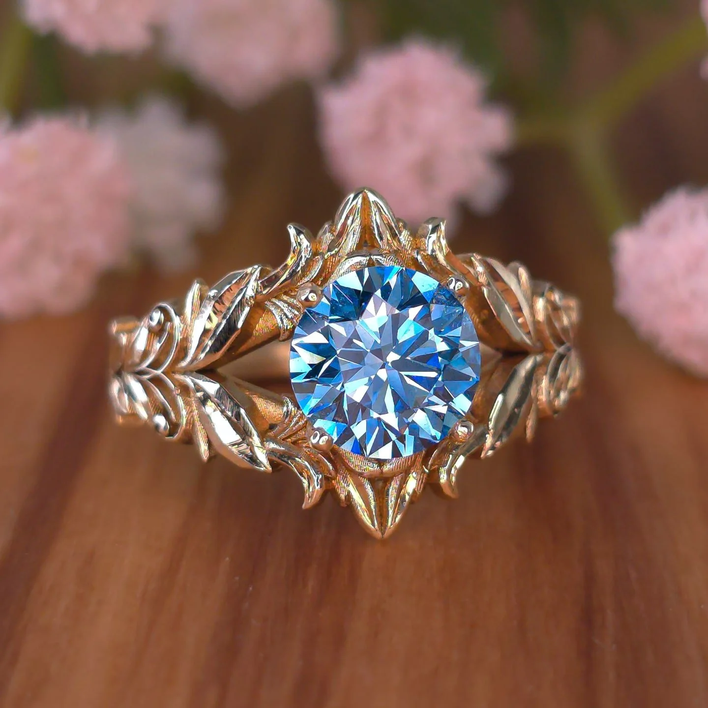 🍃✨ This design is part of my Flora Collection and is always available for custom orders through my website. I designed this ring to be understated yet ornate, combining multiple ferns and leaves with your choice of gemstone for a luxurious yet femin