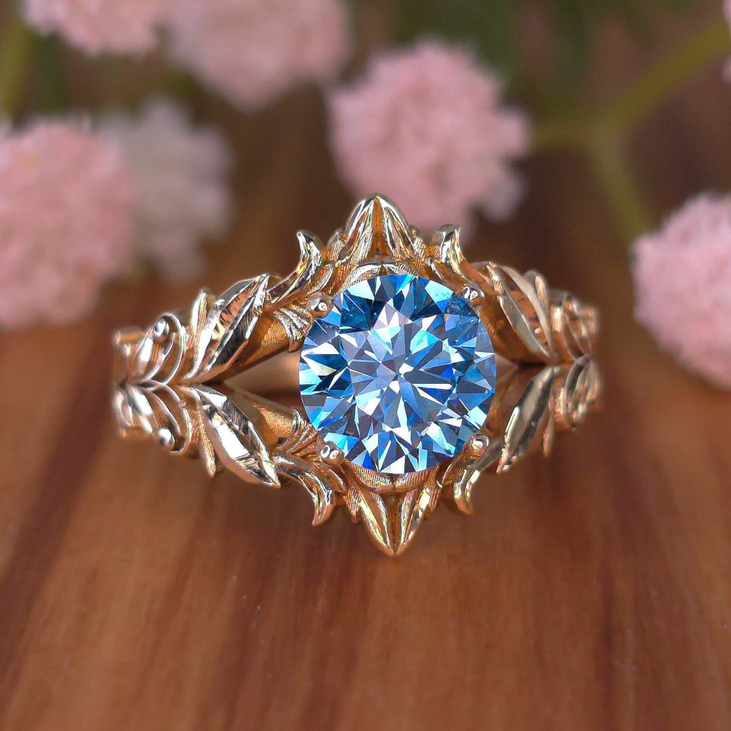 🍃✨ This design is part of my Flora Collection and is always available for custom orders through my website. I designed this ring to be understated yet ornate, combining multiple ferns and leaves with your choice of gemstone for a luxurious yet femin