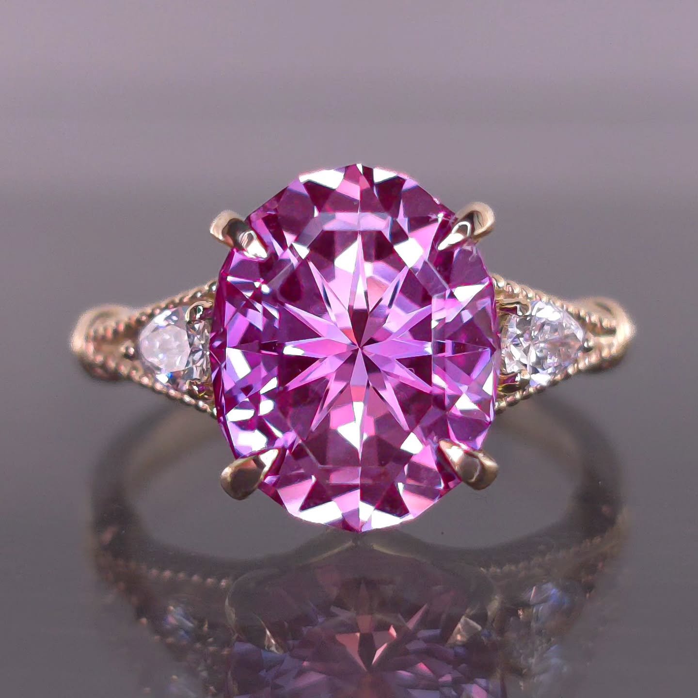 Commission ✨ This beautiful 14kt gold ring was created for a new client. They wanted a three stone ring with a vintage flare, and asked for peek-a-boo diamonds on the gallery. This ring size is quite small (size 4) and with a very large Alexandrite! 