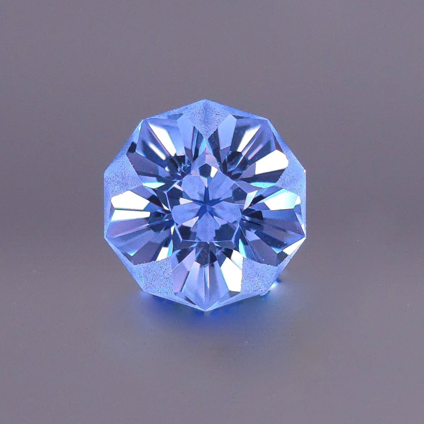 There's something special about cutting my Hibiscus gem design for clients. Just finished cutting a 7mm lab Spinel for a new piece, and I'm excited to set it in my Asymmetrical Leaf ring, which will be a beautiful fit for the client's love of floral 