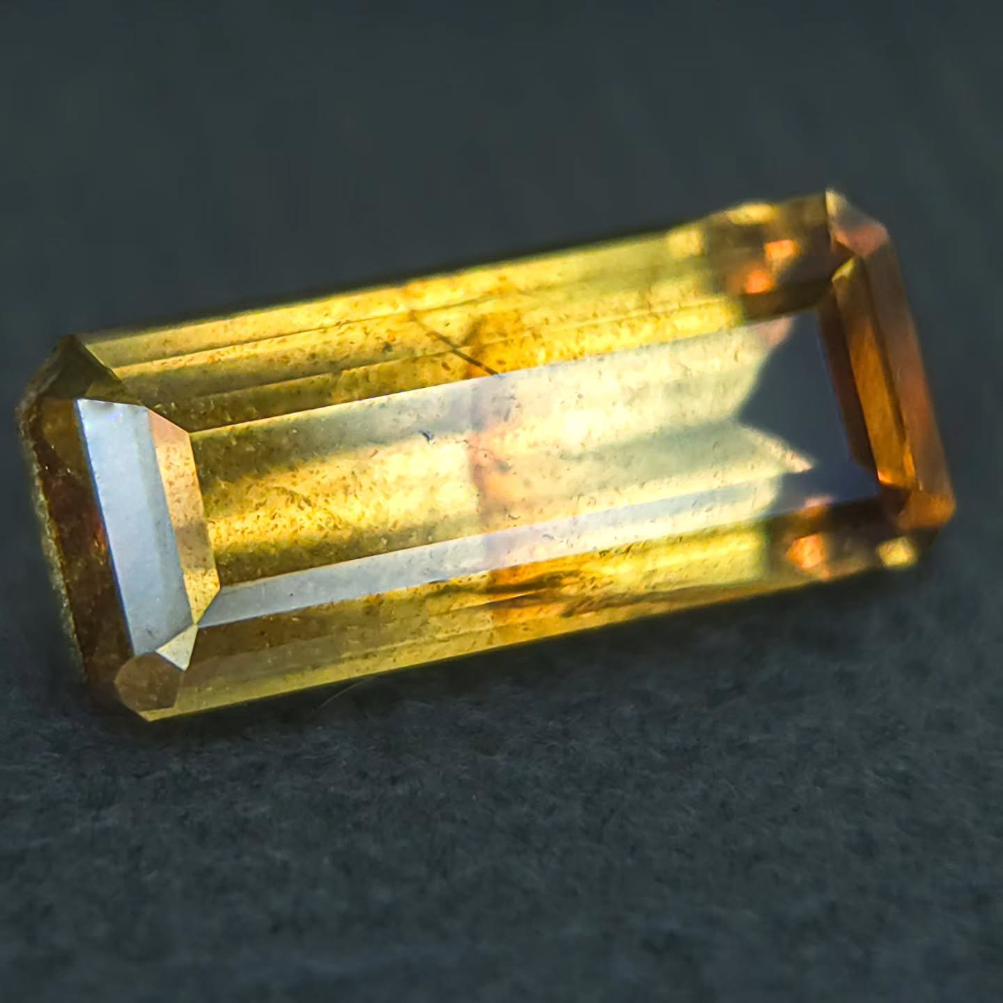 Sharing some work I did for @anzagems! This beautiful sapphire contains some colors I've never seen before. This is primarily a yellow color, but has some spots of green and then has some orange flash in yellow LED. Totally stunning and even has some
