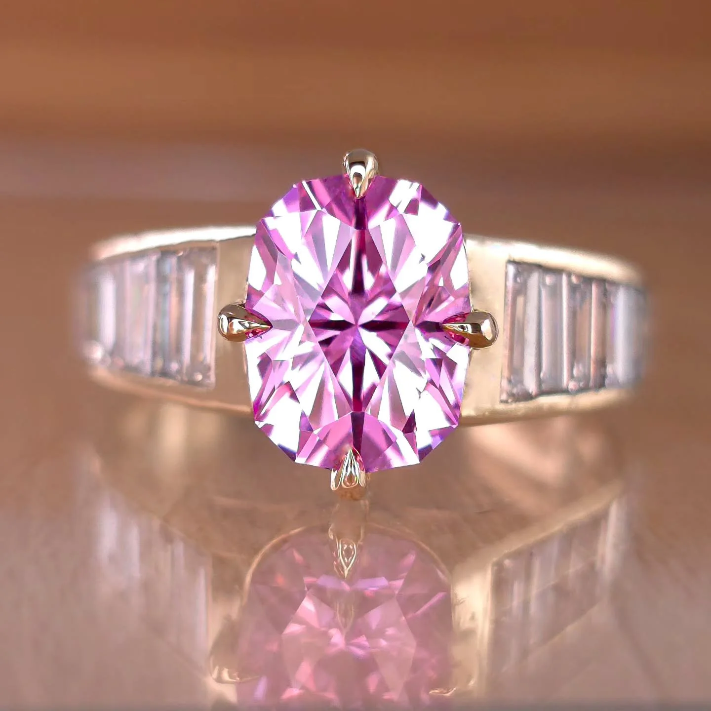Sharing work ✨ This beautiful 14k channel setting was designed and created by me with a 9mm lab sapphire in blush pink. My client was wanting to recreate grandmother's ring that has a similar vibe but wanted our main stone to be pastel color as it wa