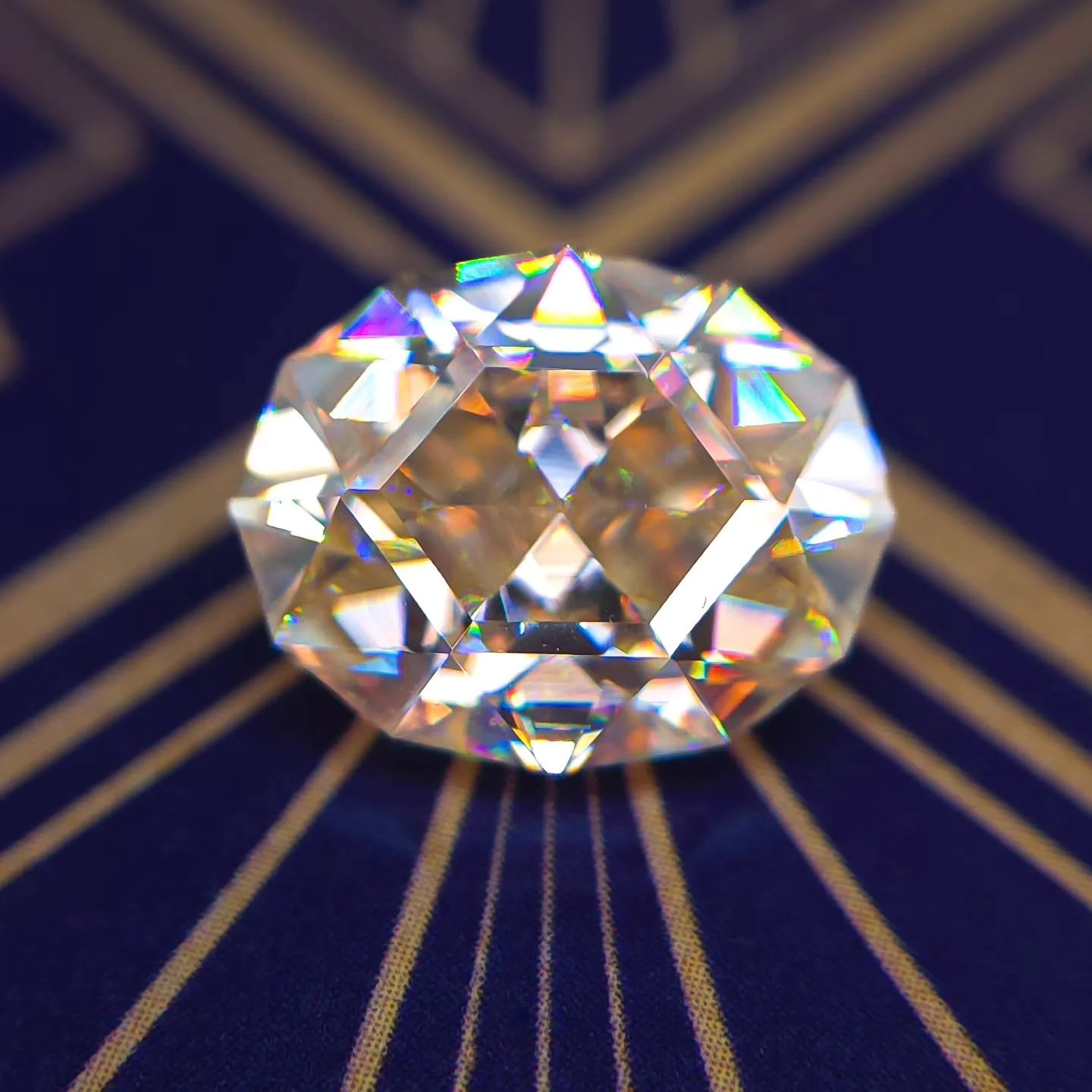 Available ✨ It's been a minute since I cut a Moissanite. This is a 6 carat, 13 x 10.5mm warm Moissanite and was actually cut by me and @opticalgains, in a design by Jim Perkins. We chose this design on the fly, and I think its so beautiful. It has su