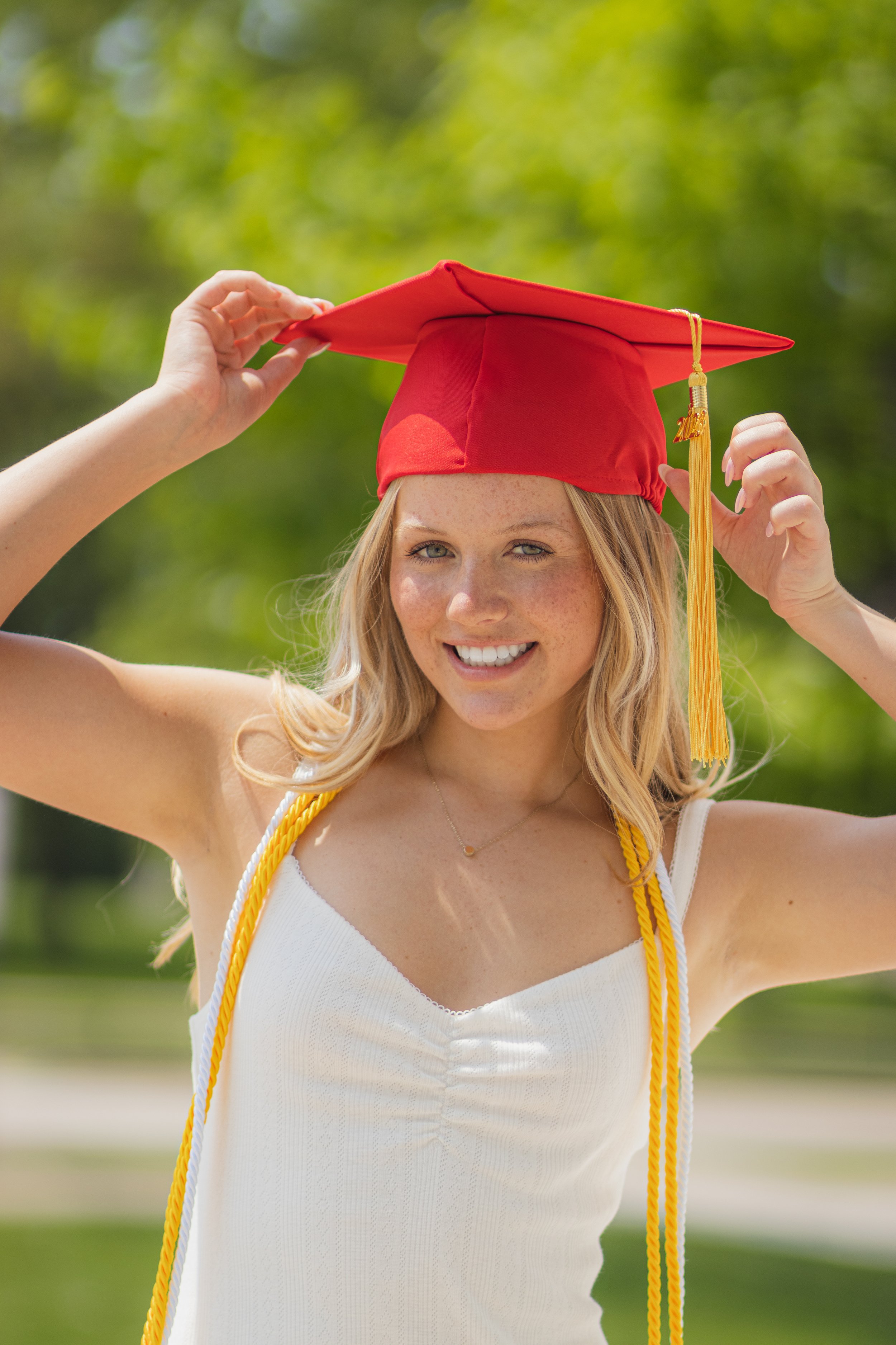 photo of recent high school grad in her cap smiling in appleton wisconsin