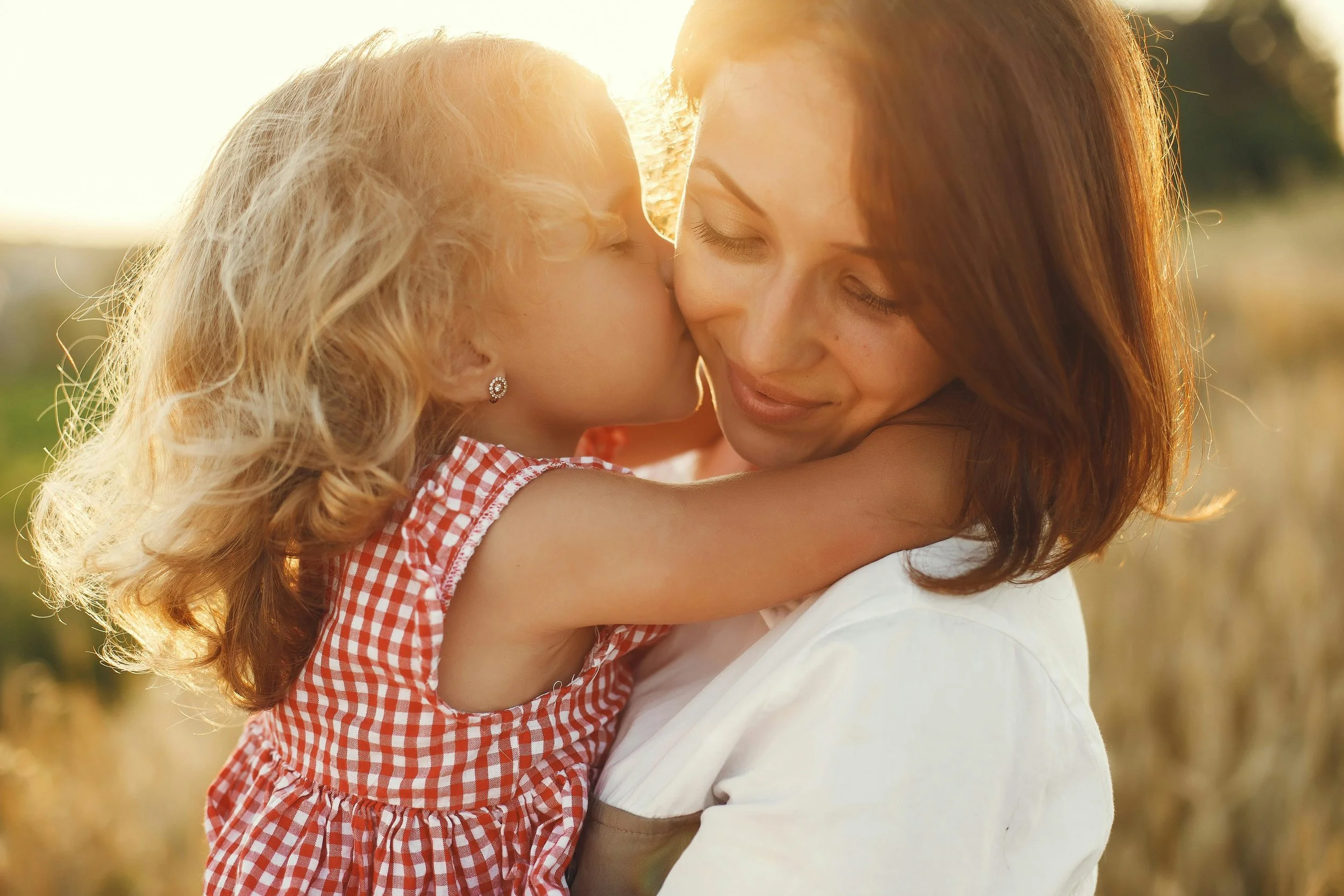 Christian mother teaching her daughter biblical values, faith, identity in Christ, and Christian character