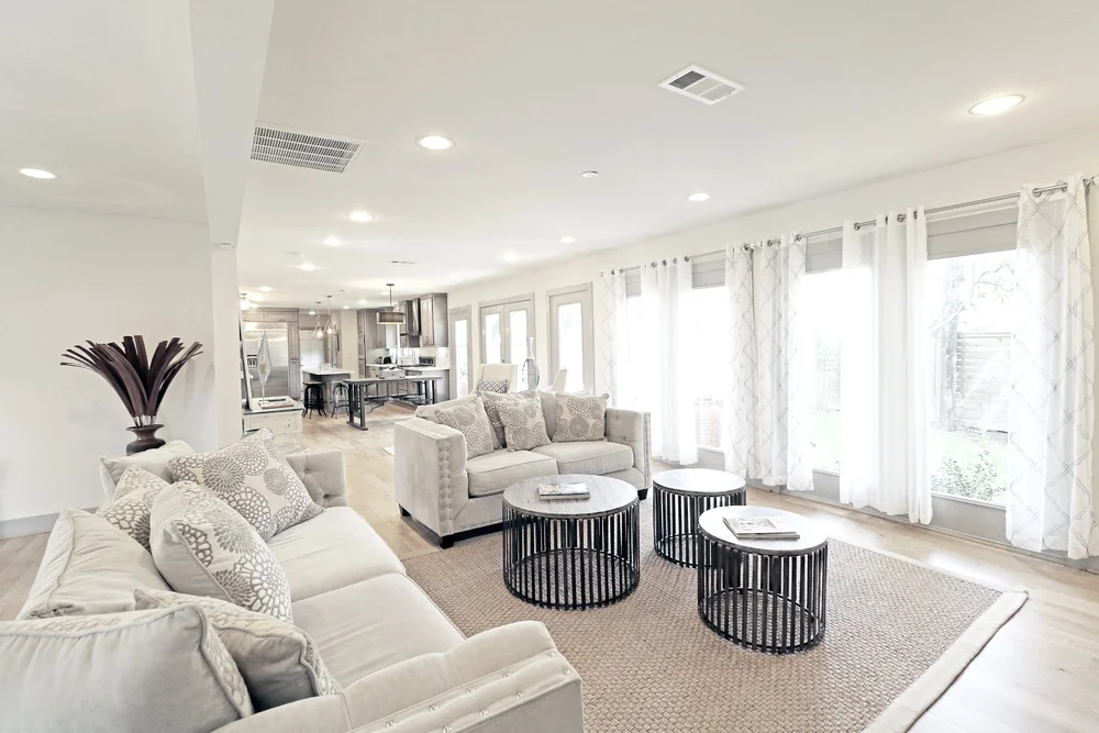 Bright open-plan living room in a furnished Luxurway rental home in Houston