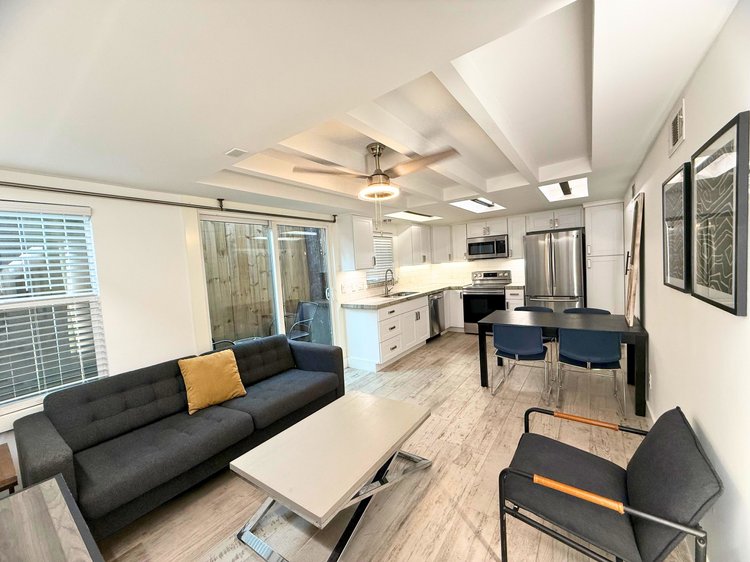 Living room at Montrose Retreat, a one bedroom furnished apartment in the Montrose area of Houston