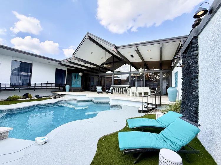 Exterior of Villa Rica, a four bedroom furnished house with four and a half bathrooms in Meyerland, Houston