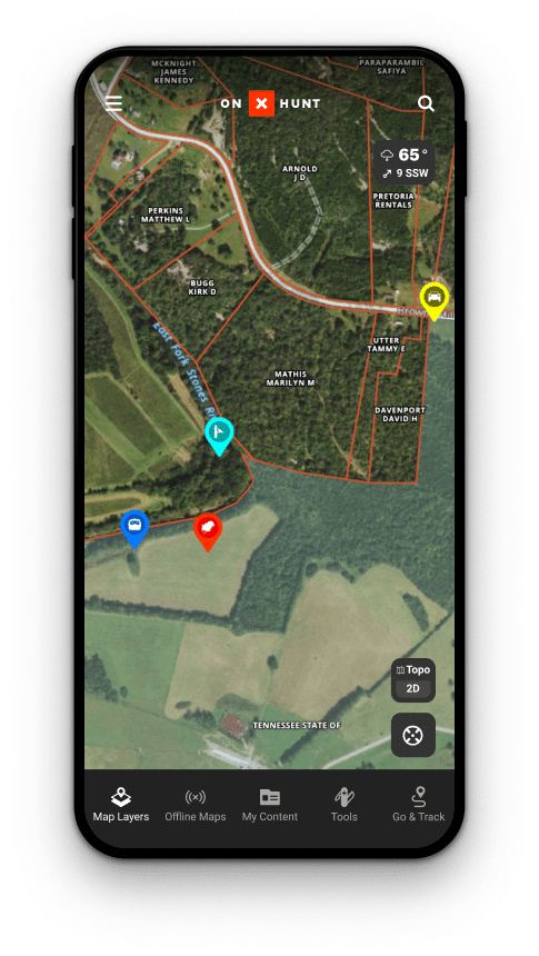 Screenshot of a mobile app displaying a map with property boundaries and landowner names. Various markers are placed on the map, denoting different points of interest. The app interface includes menu options for map layers, offline maps, content, too