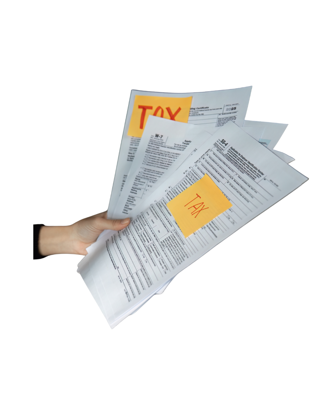 Overhead view of a person handling tax documents, including a tax form labeled "Tax Withholding and Estimated Tax," a receipt, a yellow sticky note, a small American flag illustration, a smartphone with a calculator app open, a pen, and other paperwork on a white wooden surface.