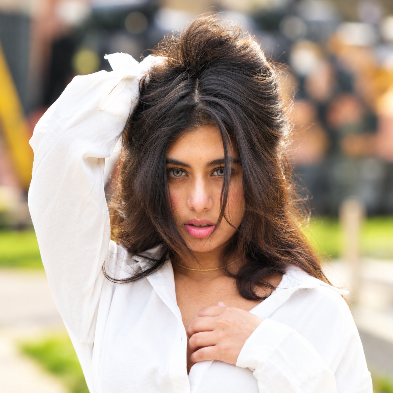 Sunlit Urban Portrait with Tousled Hair.png