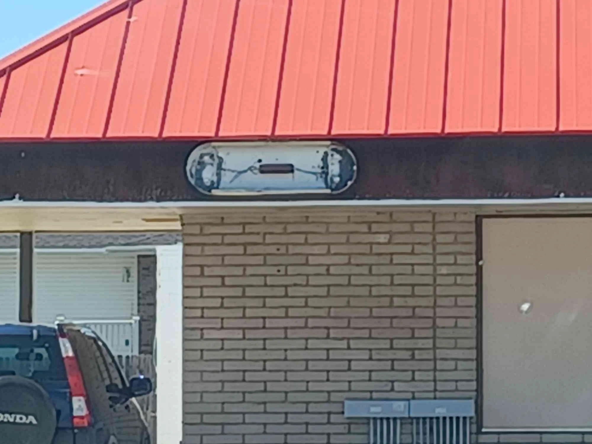 Broken unrelated signage.