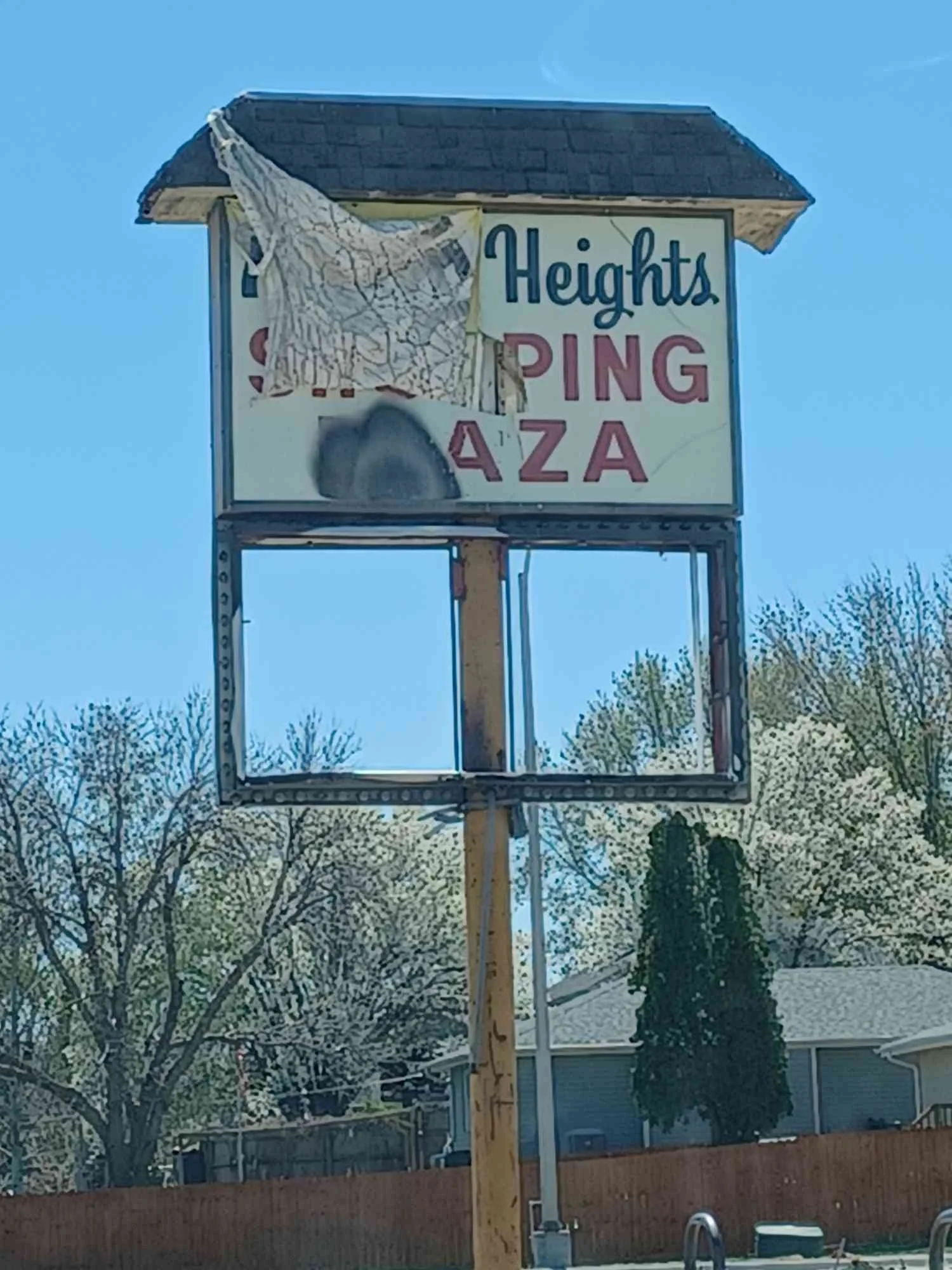 Sign decay to the main sign to draw people in.