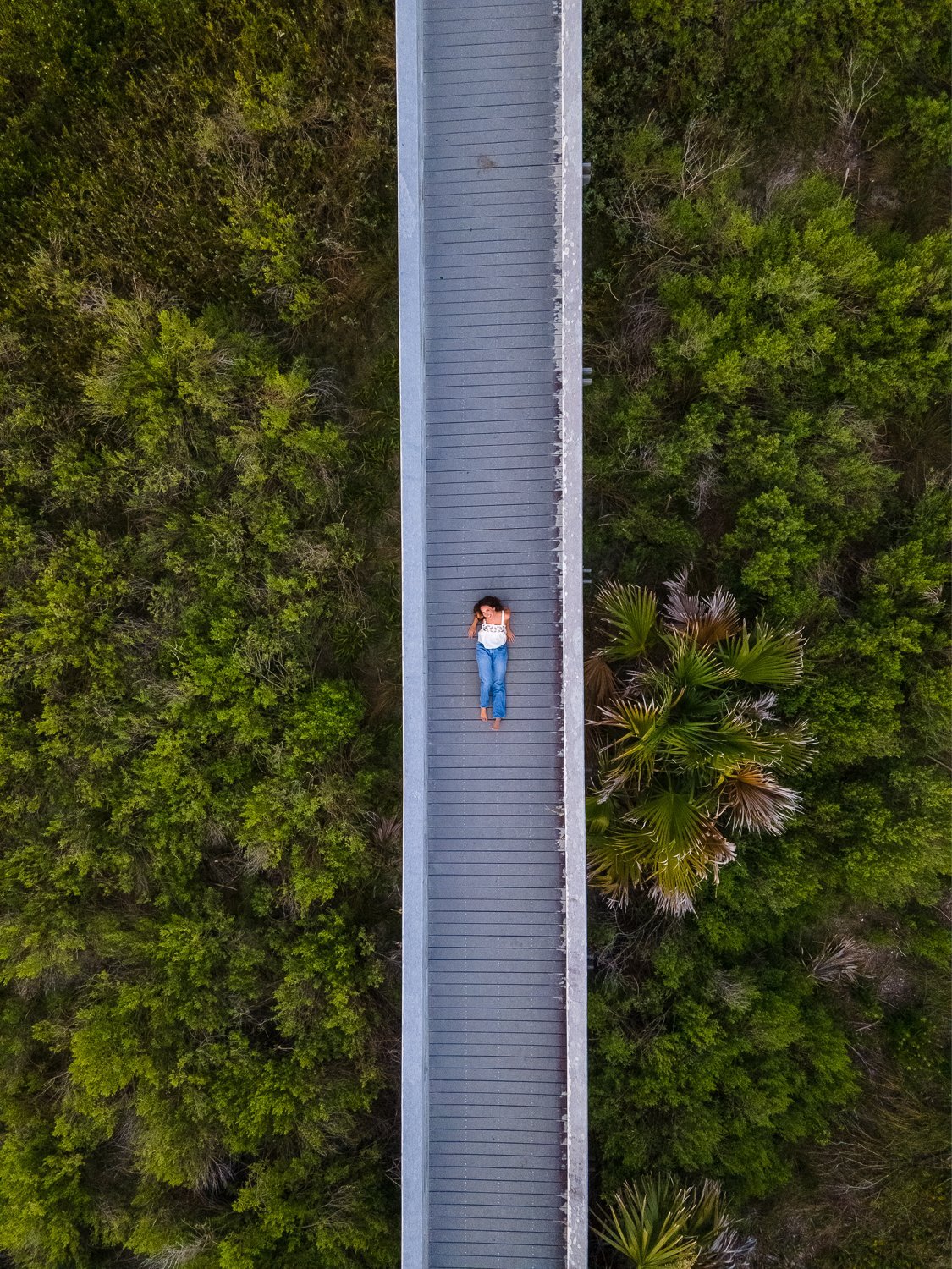 drone senior photography on the boardwalk in st.augustine