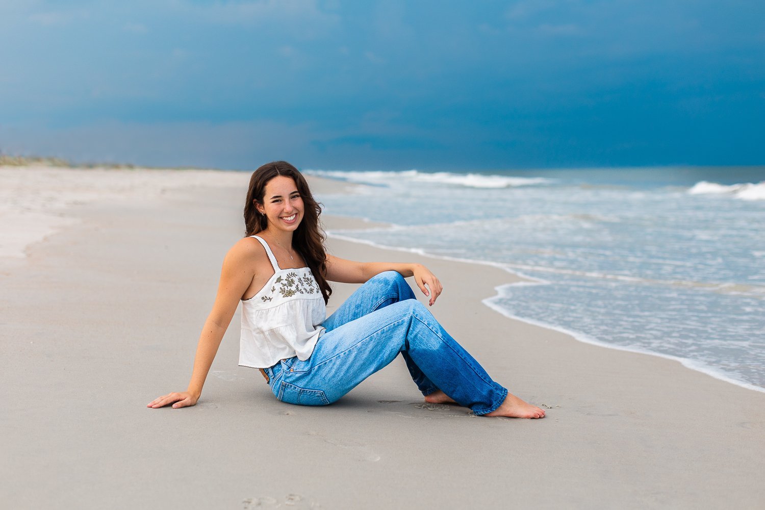 Anastasia State Park beach photoshoot with a senior before the storm