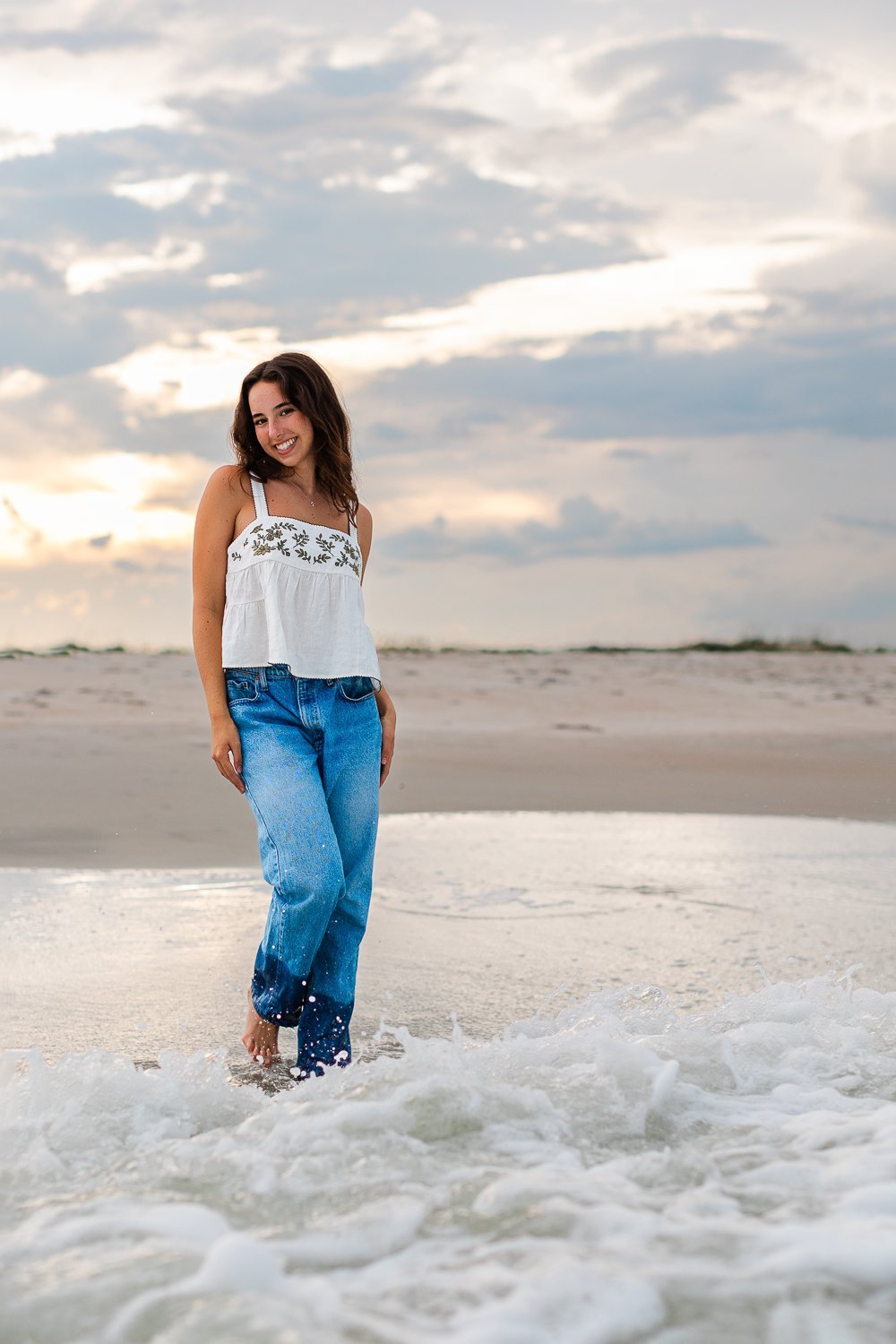 Sunset senior pictures in the waves in St.Augustine FL