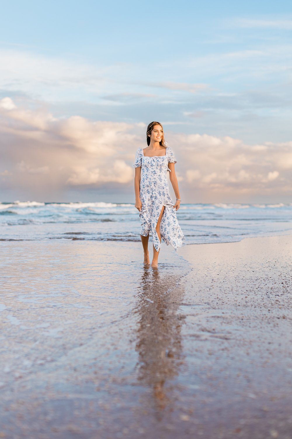 Senior girl walking in the beach during sunset in St.Augustine FL