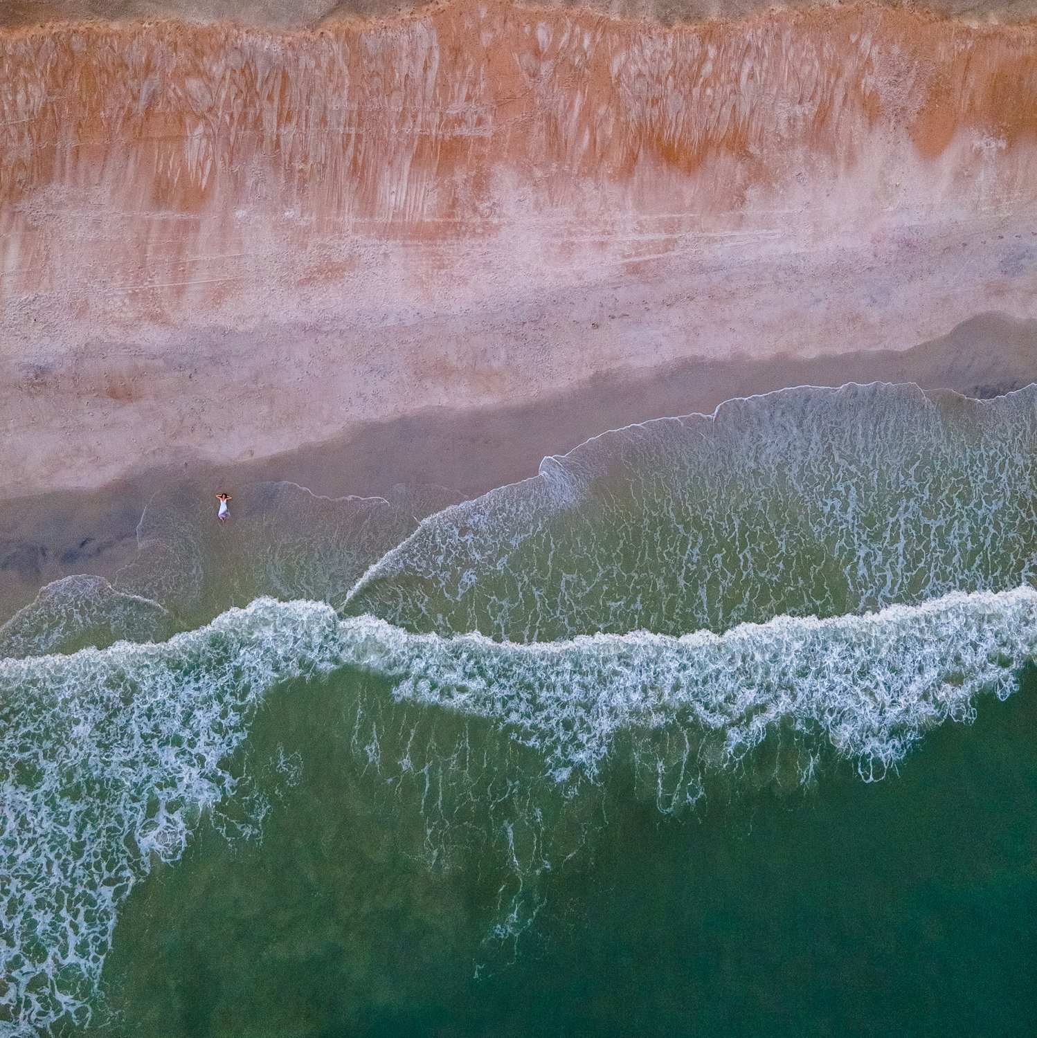 Stunning drone image of senior girl in the beach in St.Augustine FL