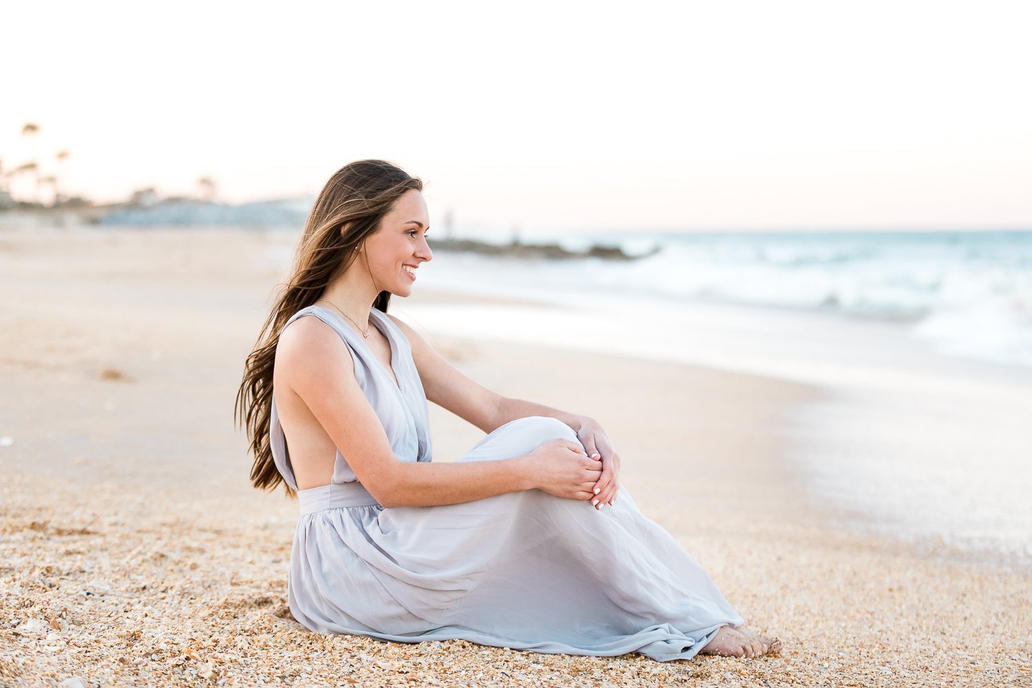 Sitting posing ideas at the beach with seniors and college grads