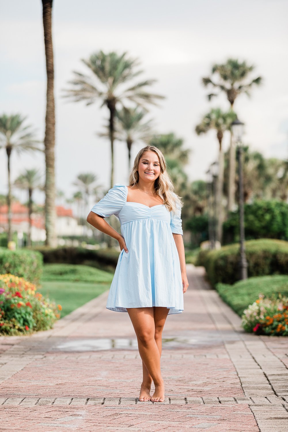 Senior pictures in Ponte Vedra with palm trees in the background - posing inspiration 