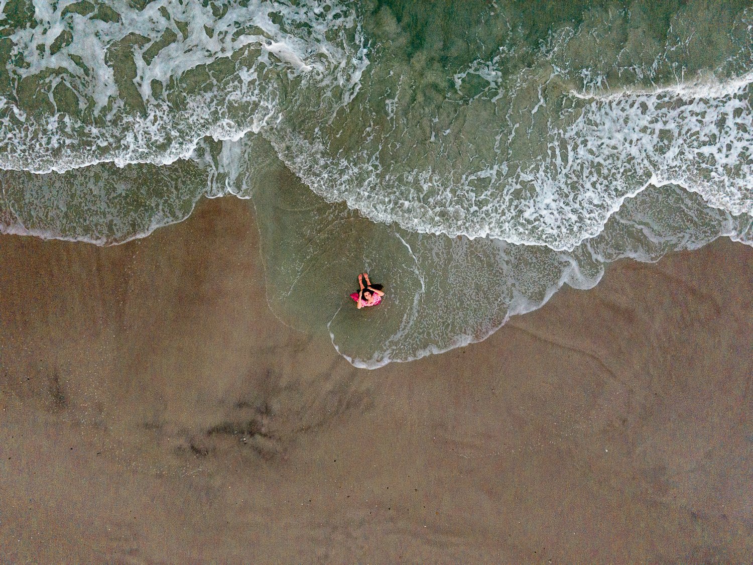 Beach drone pictures of senior girl in Ponte Vedra Beach, FL