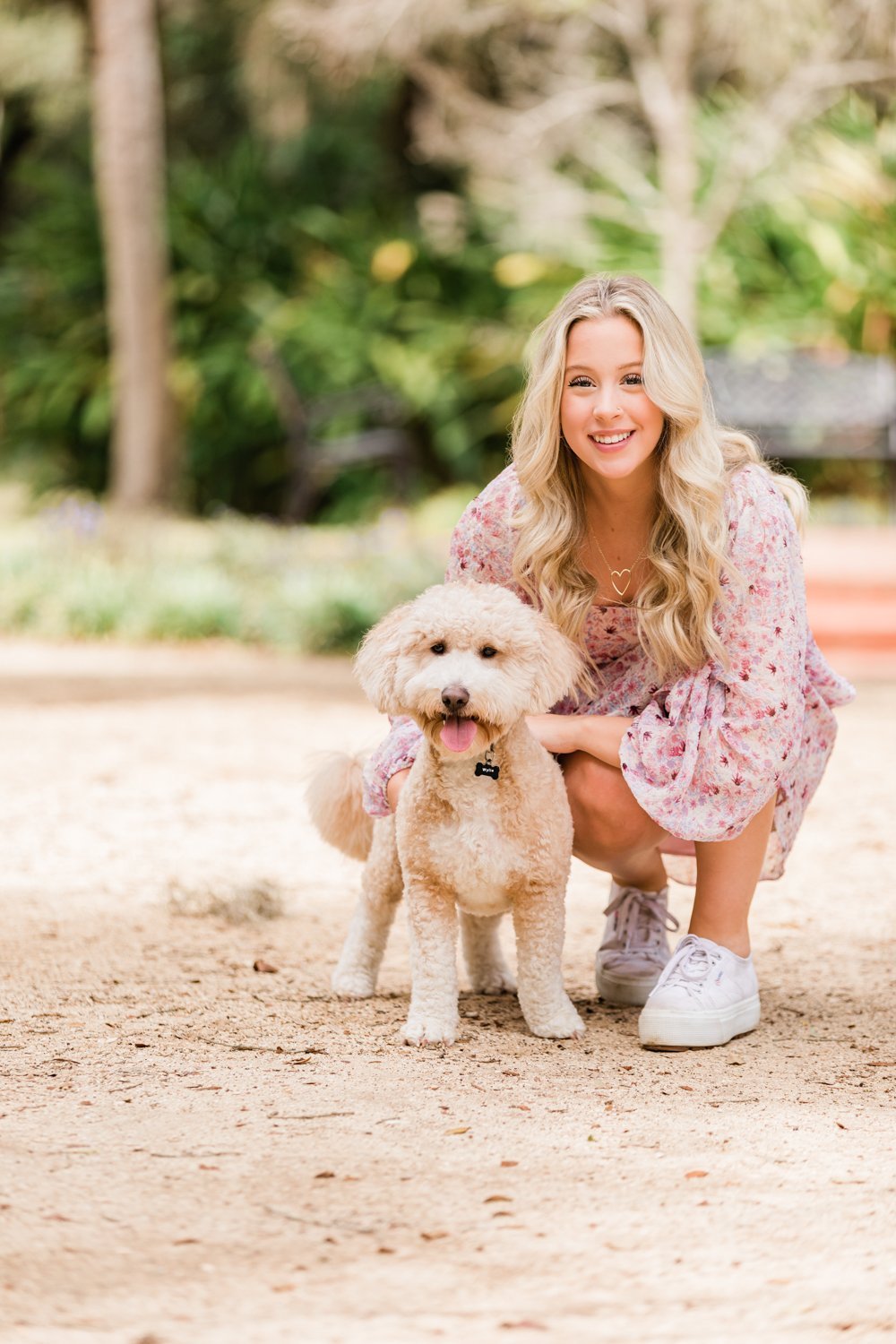 High school senior pictures with a pet in Washington Oaks Gardens