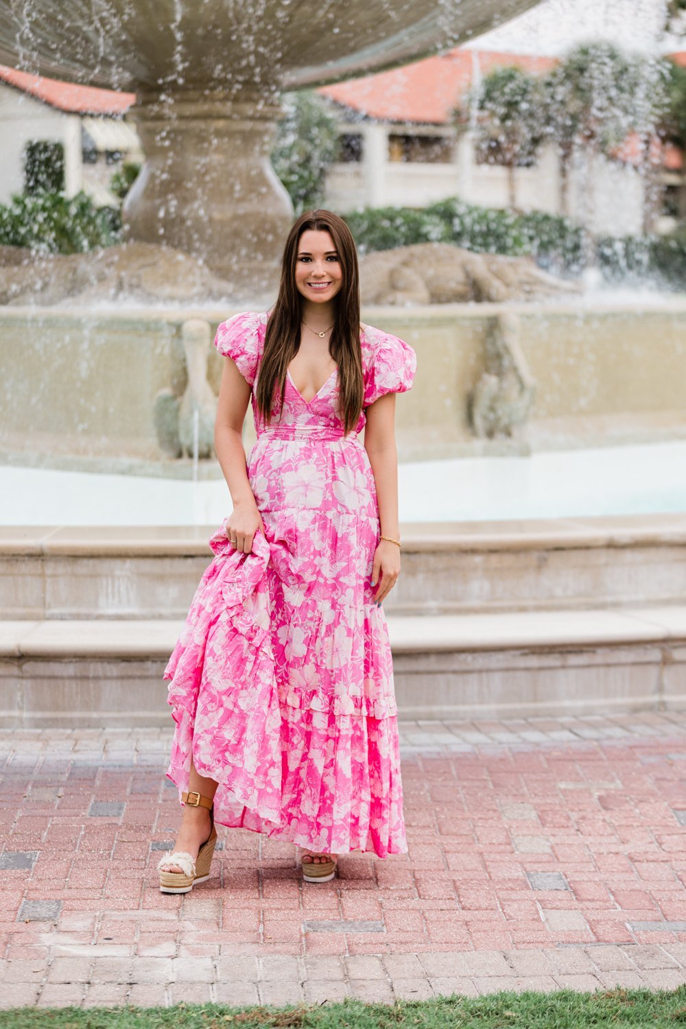 High school senior photoshoot by the fountain in Ponte Vedra Inn and Club