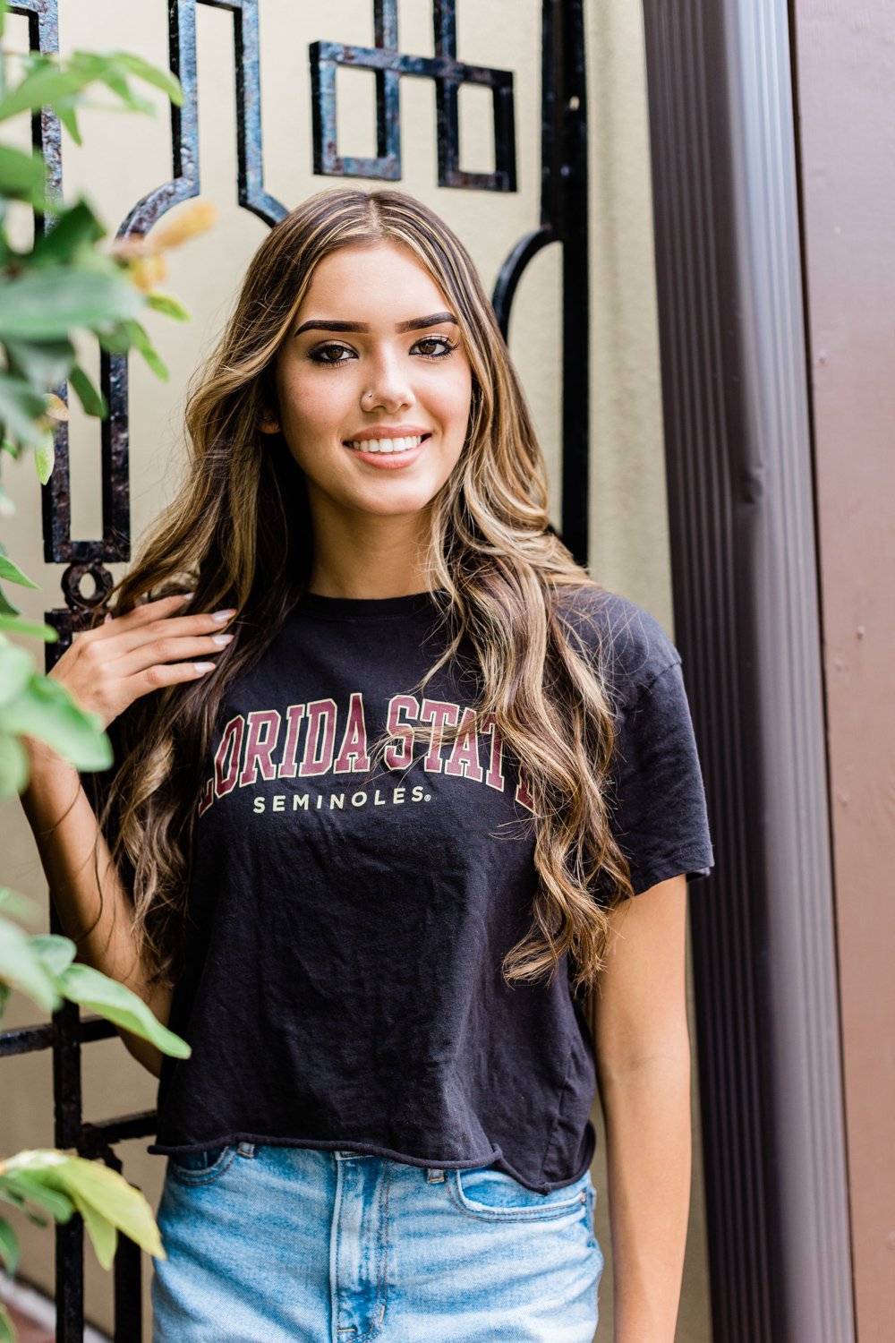 senior girl pictures with university t-shirt in st.augustine