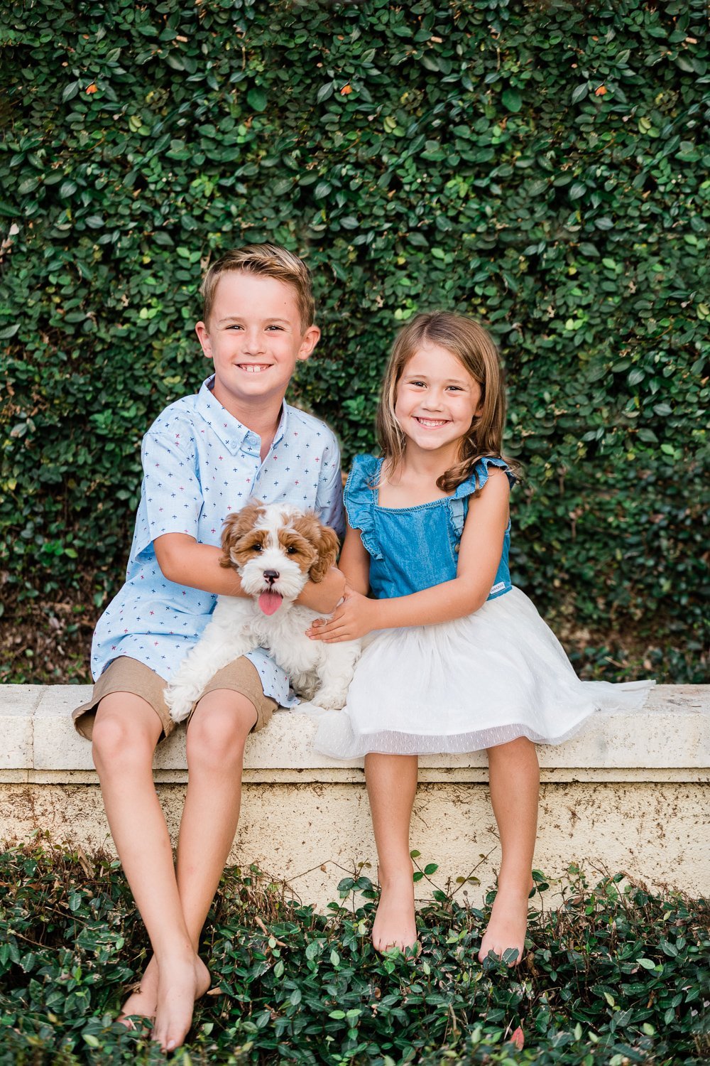 kids picture ideas with a dog pet - posing ideas for families in Nocatee