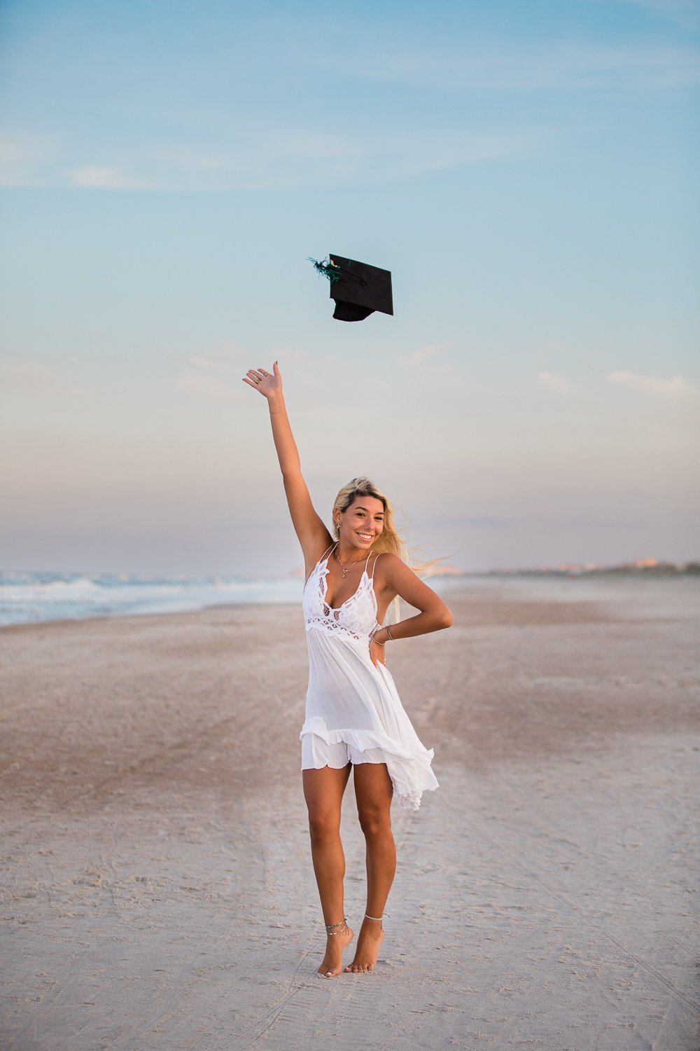 Posing ideas at the beach with high school senior in summer Jacksonville FL