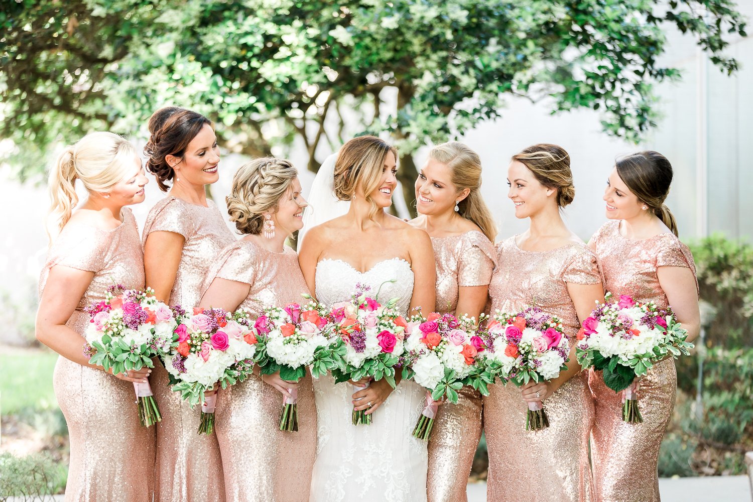 Bridal party in rose gold sequin dresses