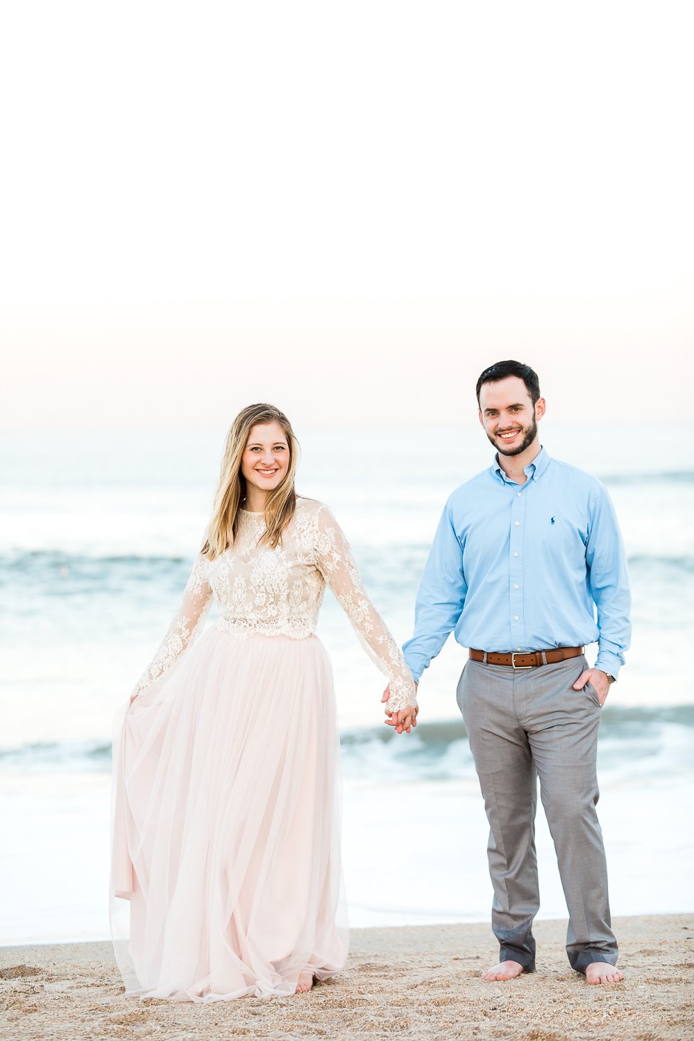 Couple walking at the beach in Ponte Vedra, FL